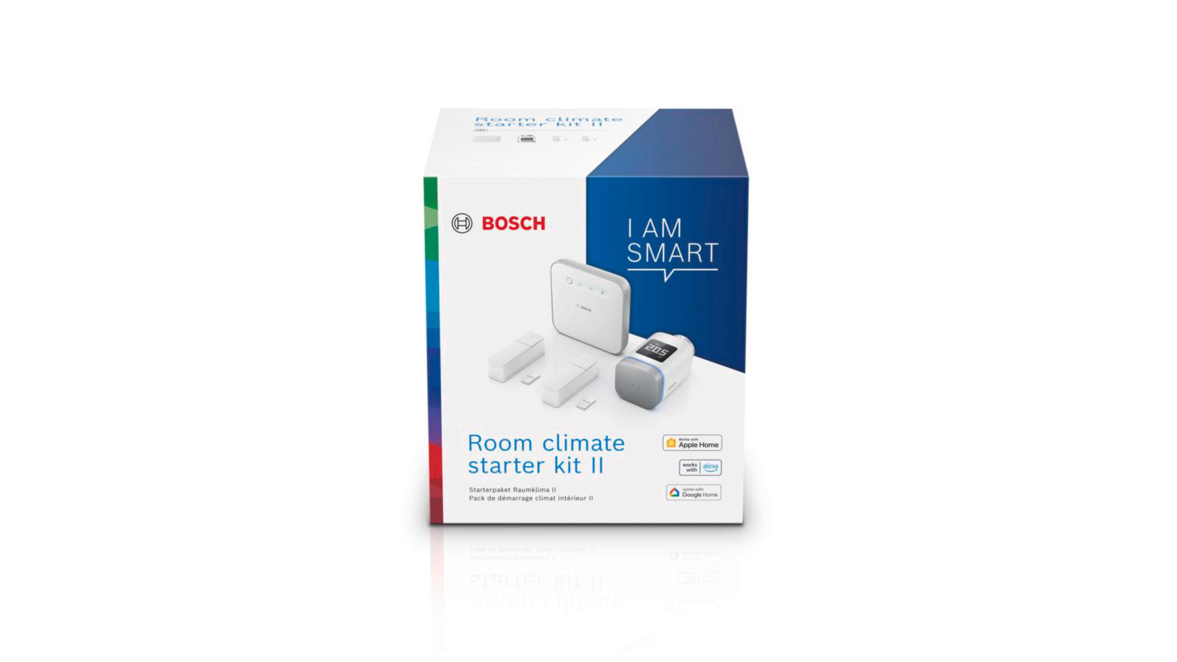 Box mit Smart-Home-Geräten, Text und Logo auf weißem Hintergrund.