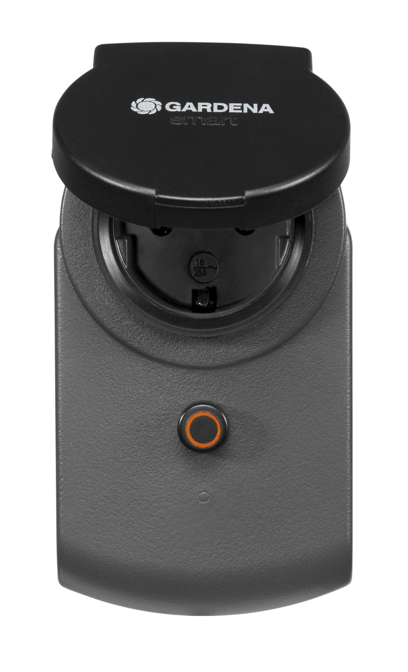 Adattatore di alimentazione intelligente Gardena grigio con coperchio aperto su sfondo bianco.