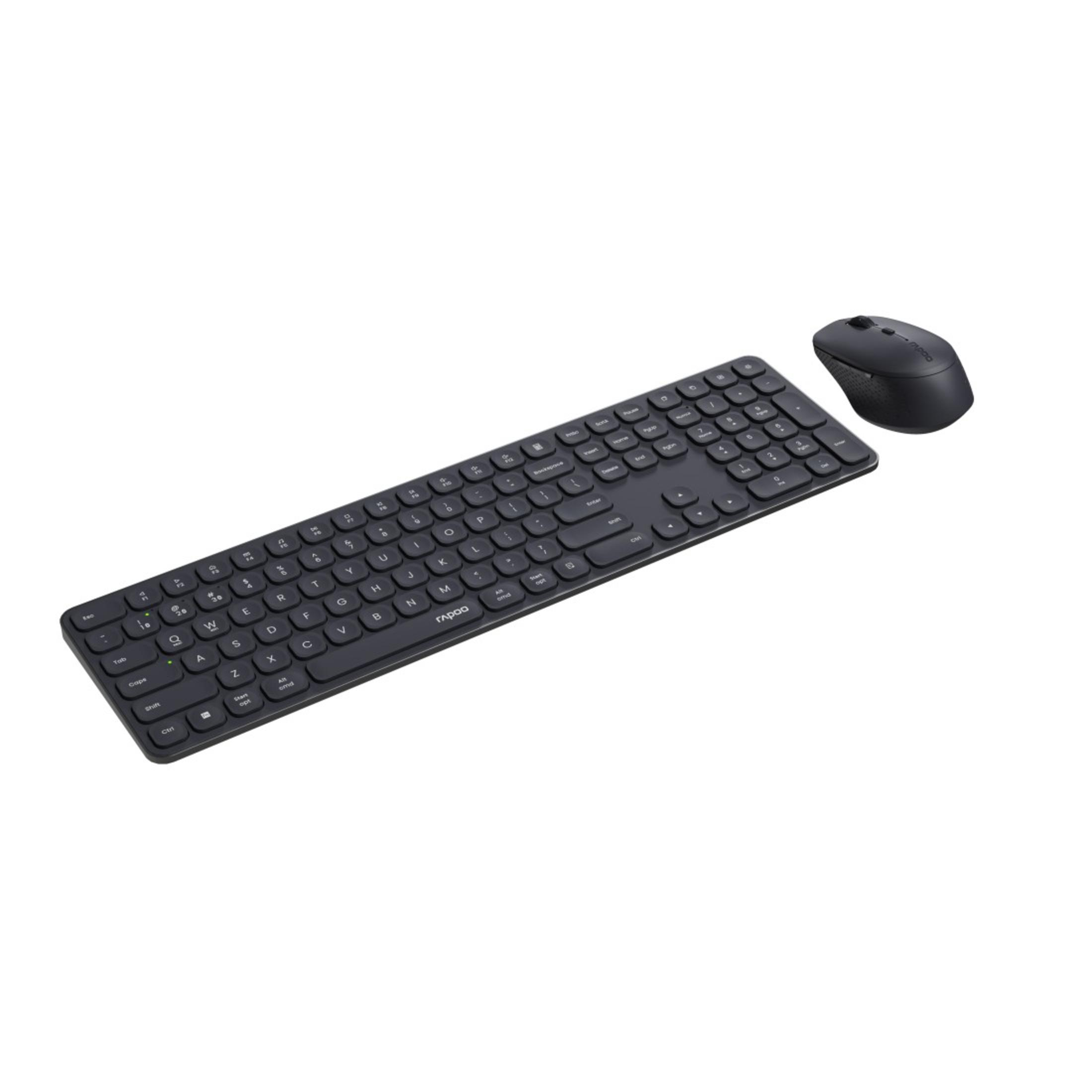 Una combo tastiera e mouse wireless nera su uno sfondo bianco.