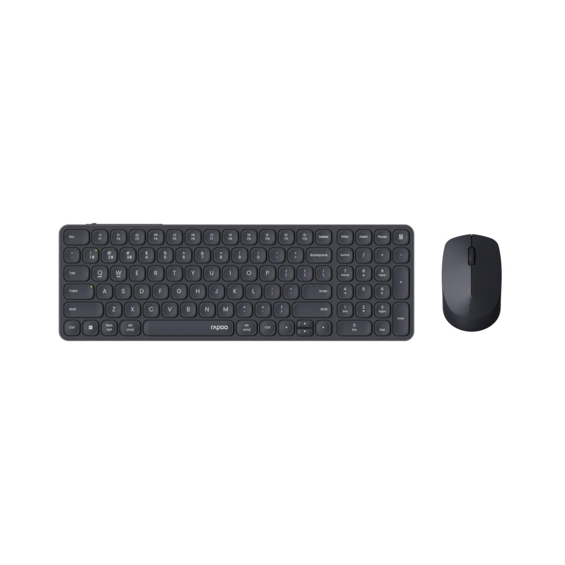 Draufsicht auf eine schwarze Tastatur und Maus auf weißem Hintergrund.