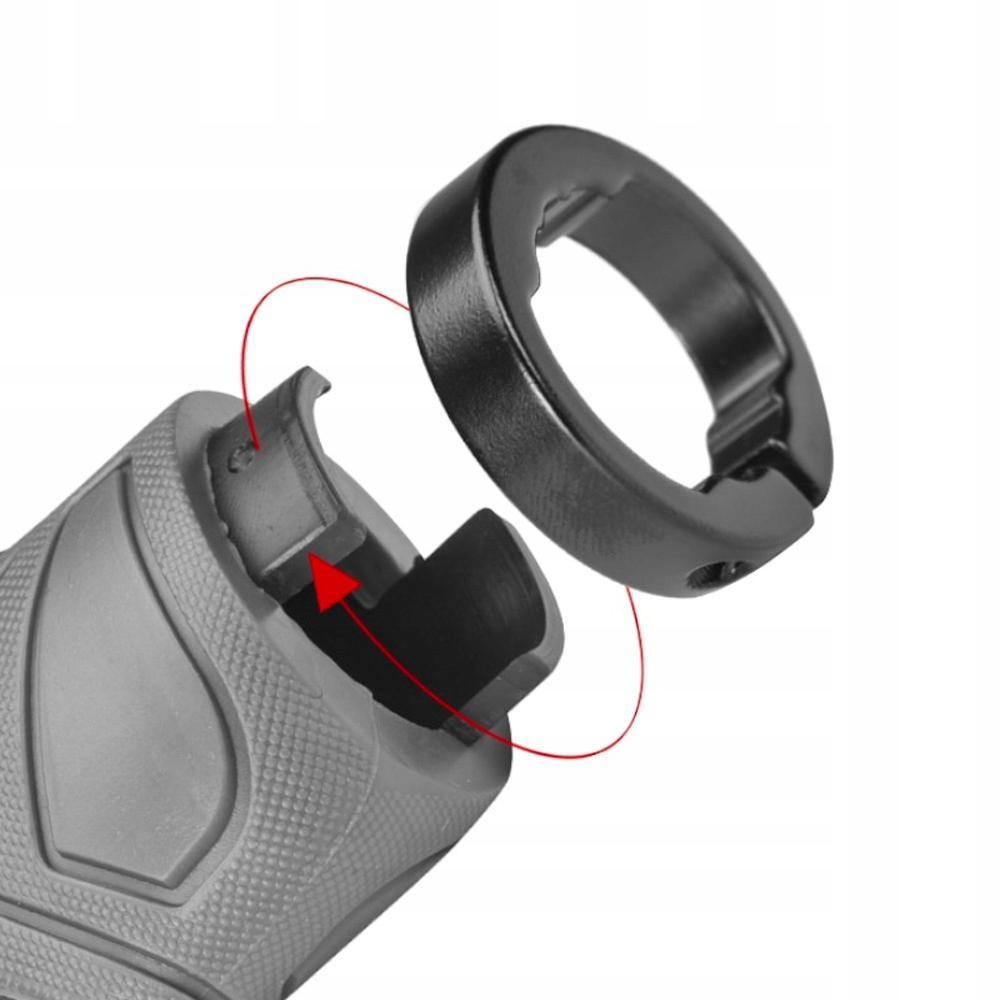 Zbliżenie na element uchwytu kierownicy i czarny pierścień. Czerwona strzałka wskazuje na montaż.