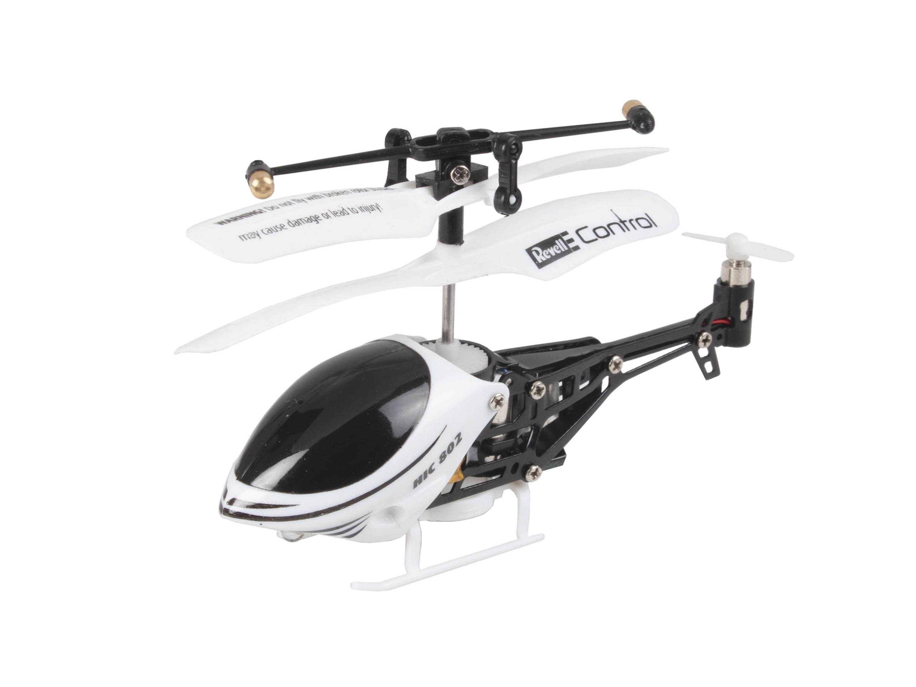 Ein kleiner RC-Hubschrauber mit weißen Rotorblättern und einem schwarz-weißen Körper.