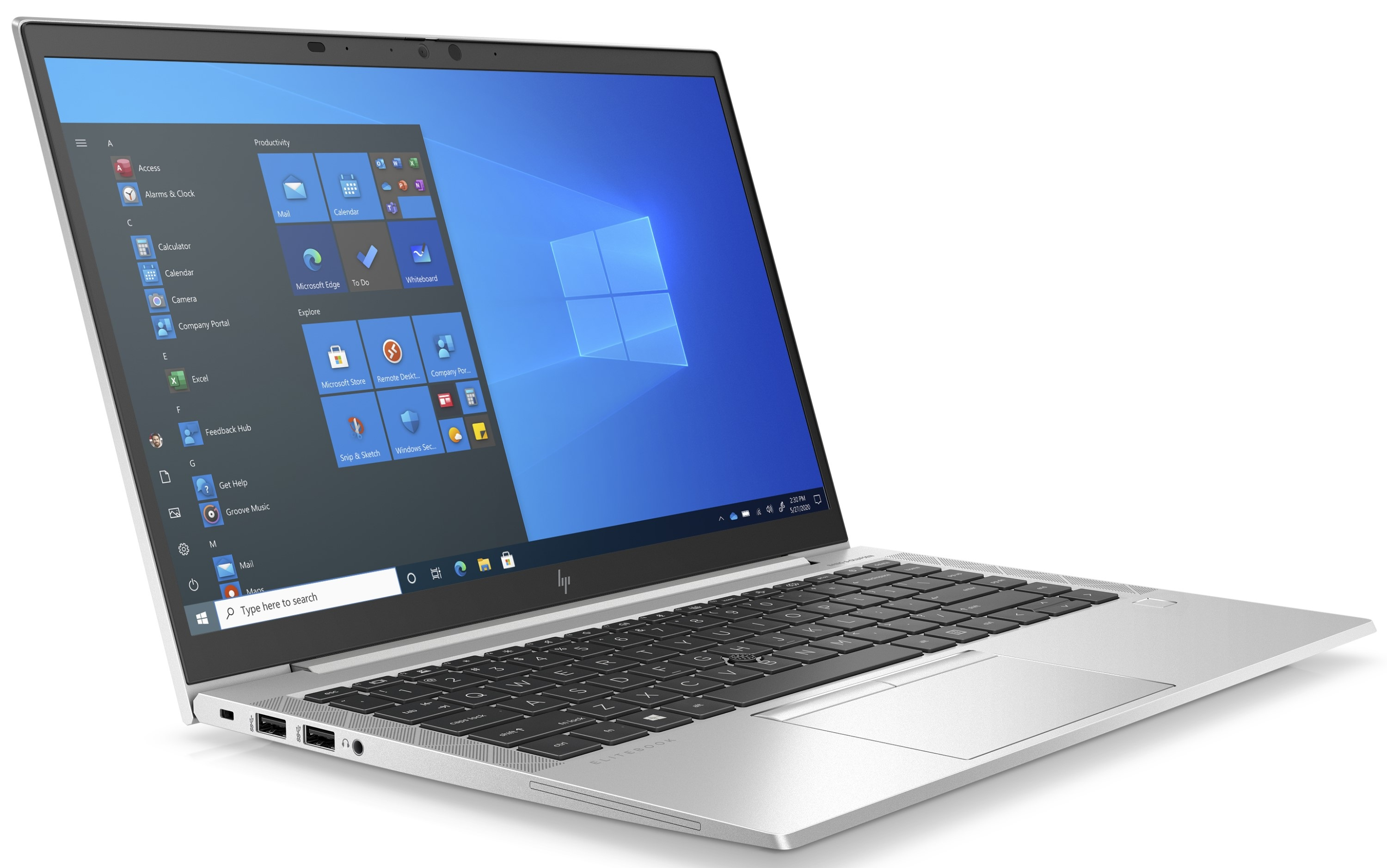 Silberner Laptop offen auf weißer Oberfläche. Bildschirm zeigt Windows 2020 Oberfläche. Apps sichtbar.