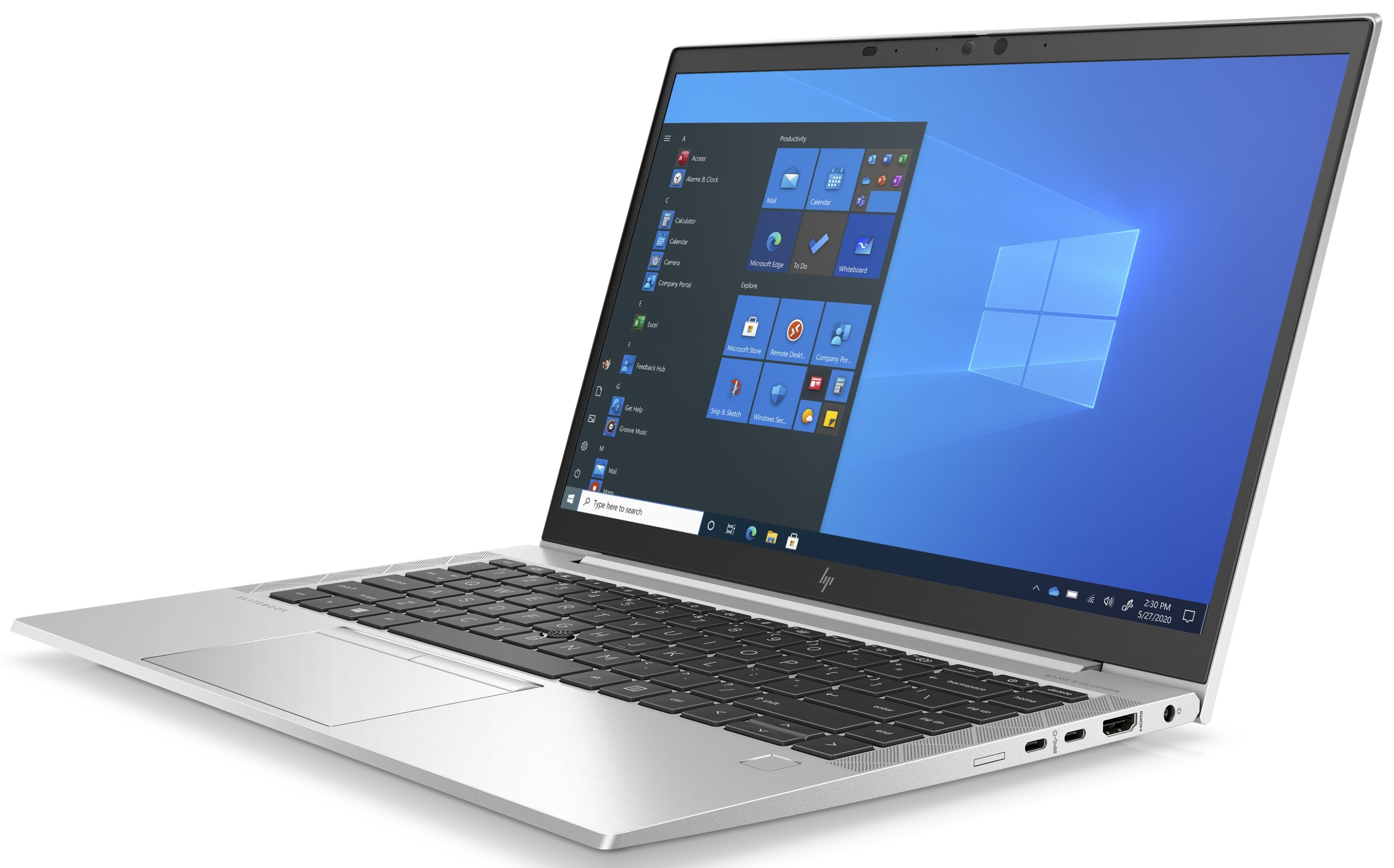 Silberner Laptop auf weißer Oberfläche. Bildschirm zeigt Windows Oberfläche. Der Laptop ist geöffnet.