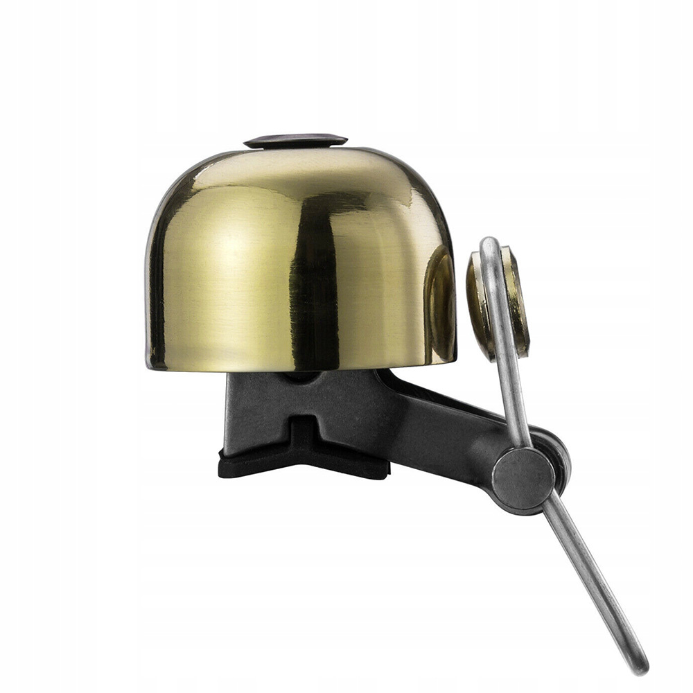 Dzwonek rowerowy. Dzwonek jest metaliczny złoty. Osprzęt montażowy jest czarny. Białe tło.