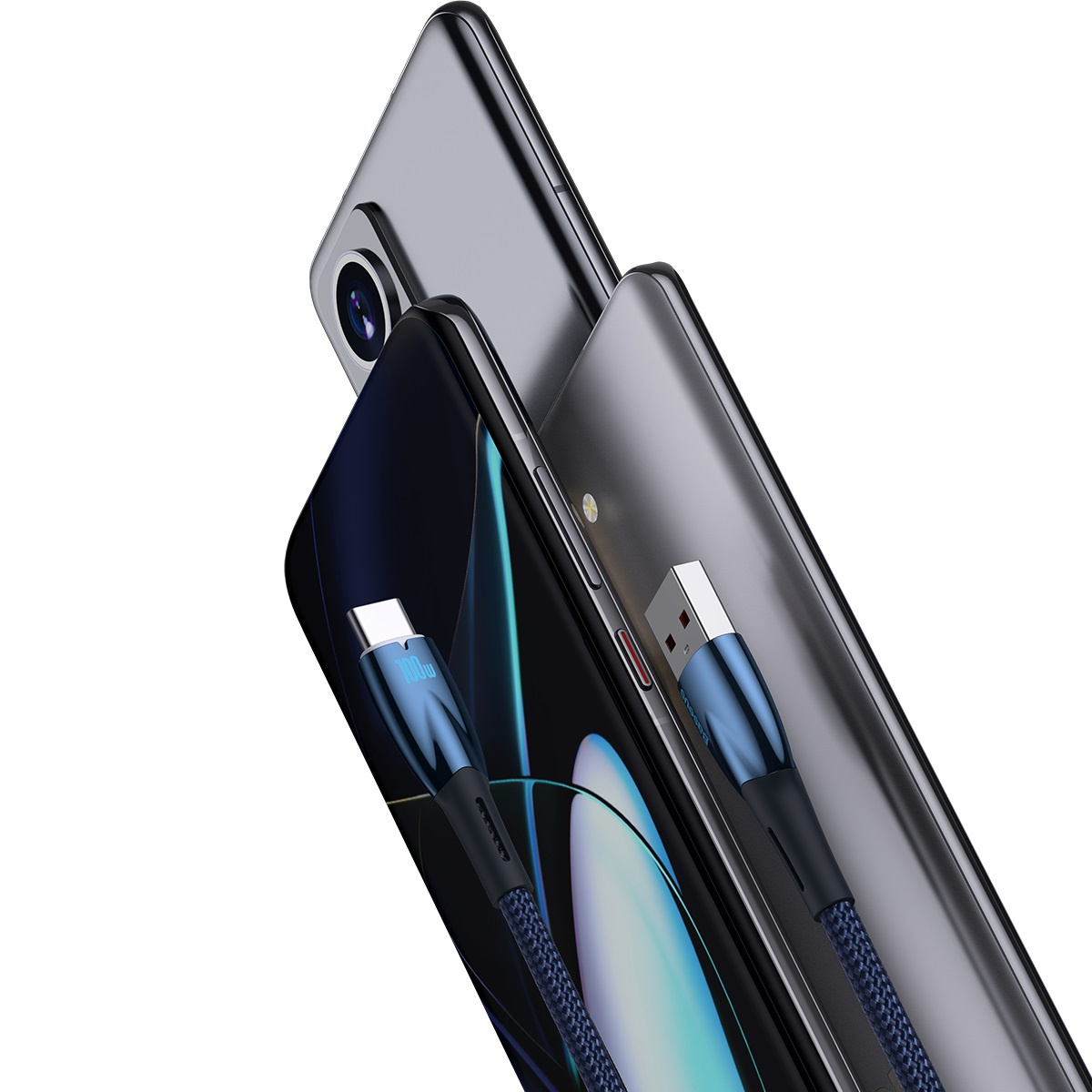 Dwa telefony, jeden z podłączonym kablem USB-C, na ciemnym tle.