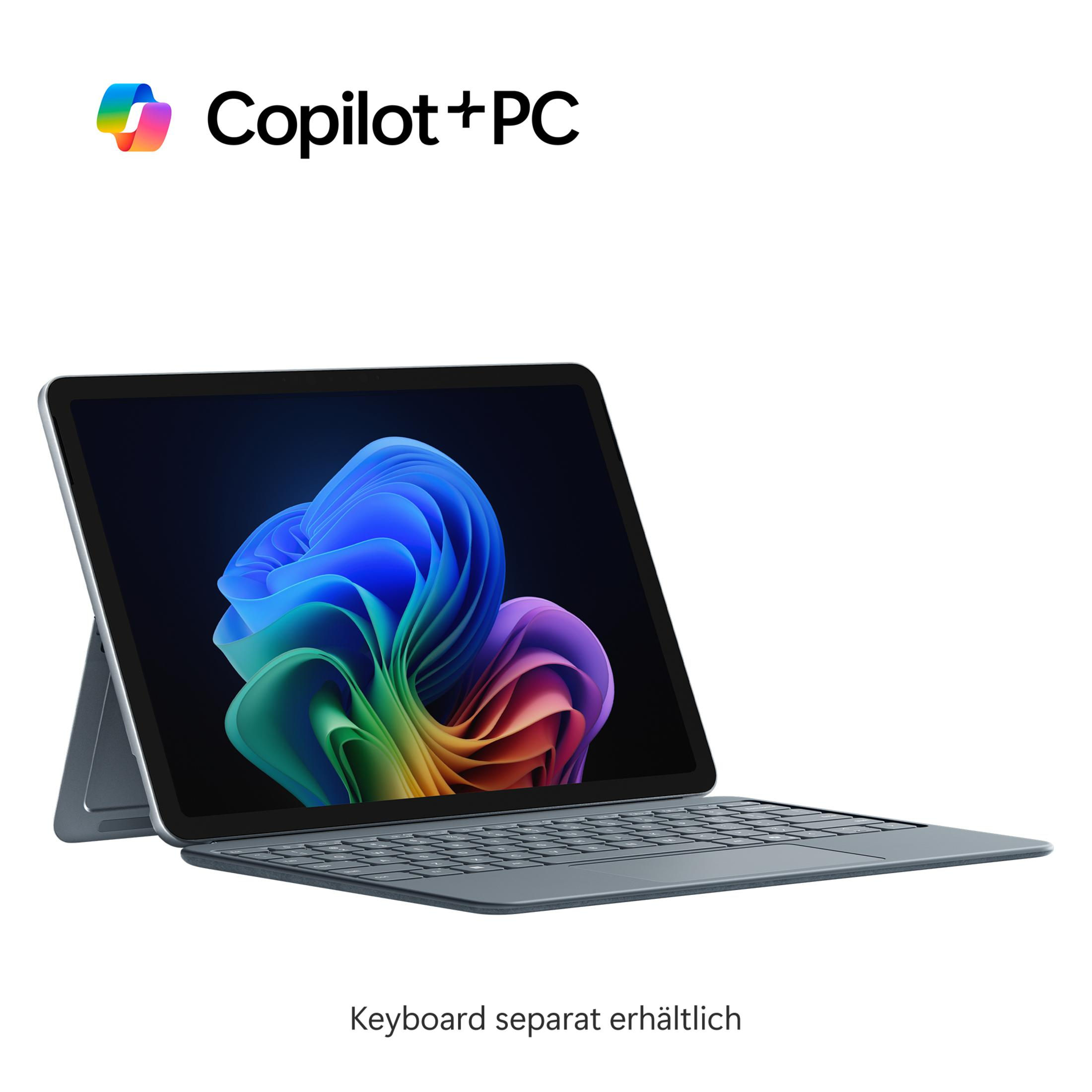Tablet z klawiaturą i logo 'Copilot+PC', na białym tle. Ekran wyświetla kolorowe kształty.