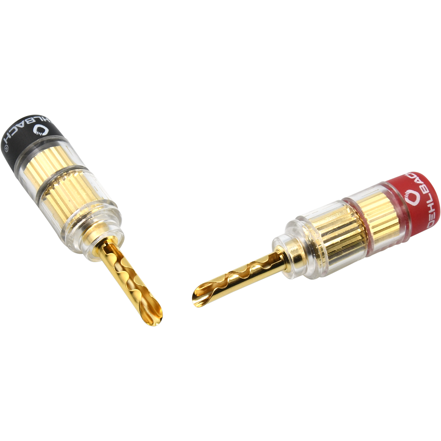 Zwei goldene Lautsprecheranschlüsse mit transparentem Kunststoff und rot/schwarzen Akzenten auf schwarzem Untergrund.