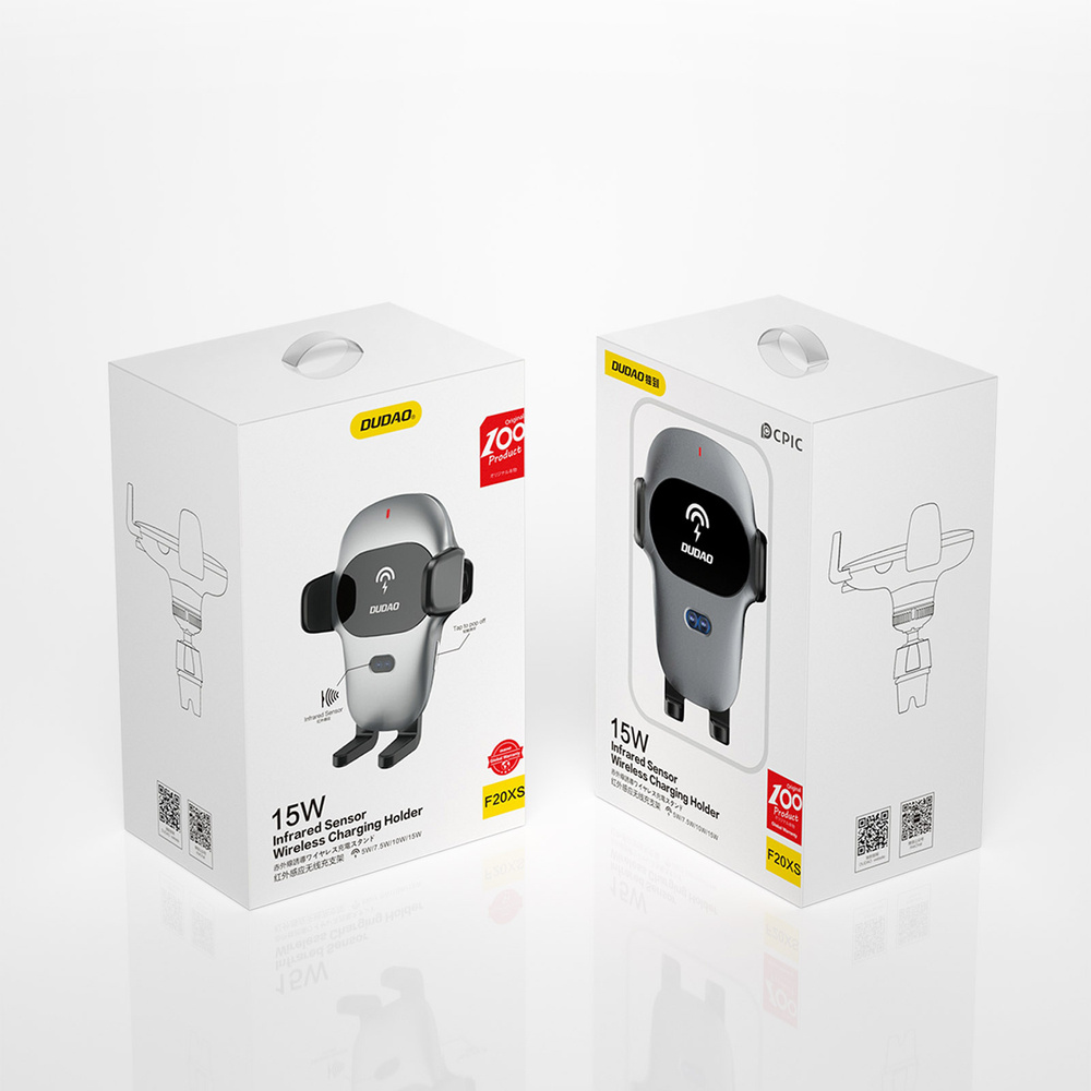 Dwa białe pudełka z uchwytem samochodowym na telefon. Pudełka mają szczegóły produktu i logo.