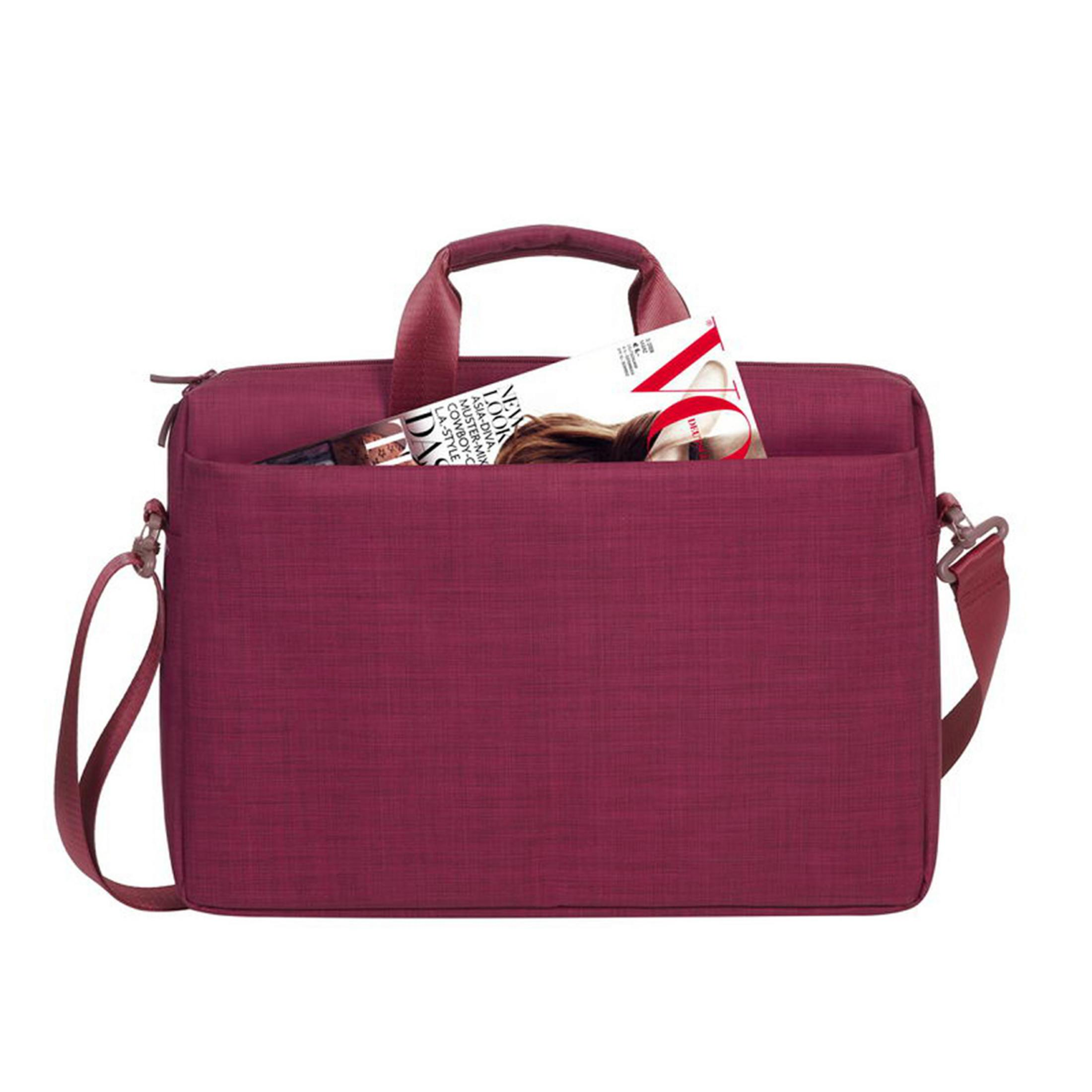 Weinrote Laptoptasche mit Magazin in der Vordertasche, freigestellt auf Weiß.