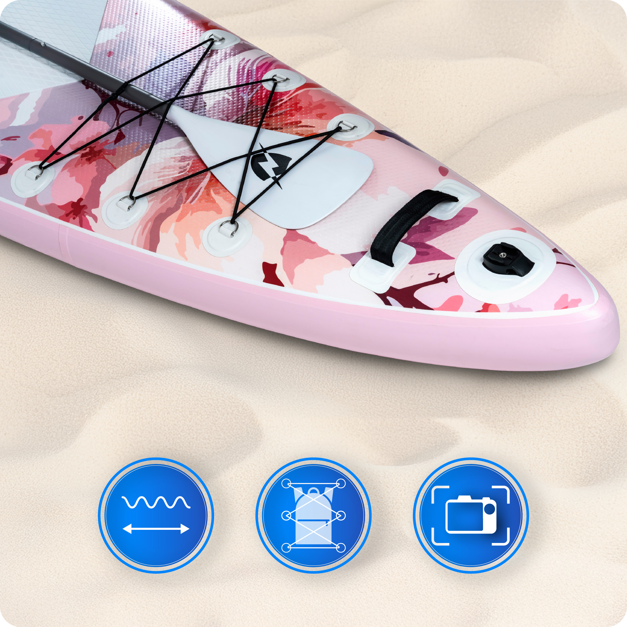 Deska SUP z różowym kwiatowym wzorem. Zawiera wiosło i ikony fali, sieci i kamery.