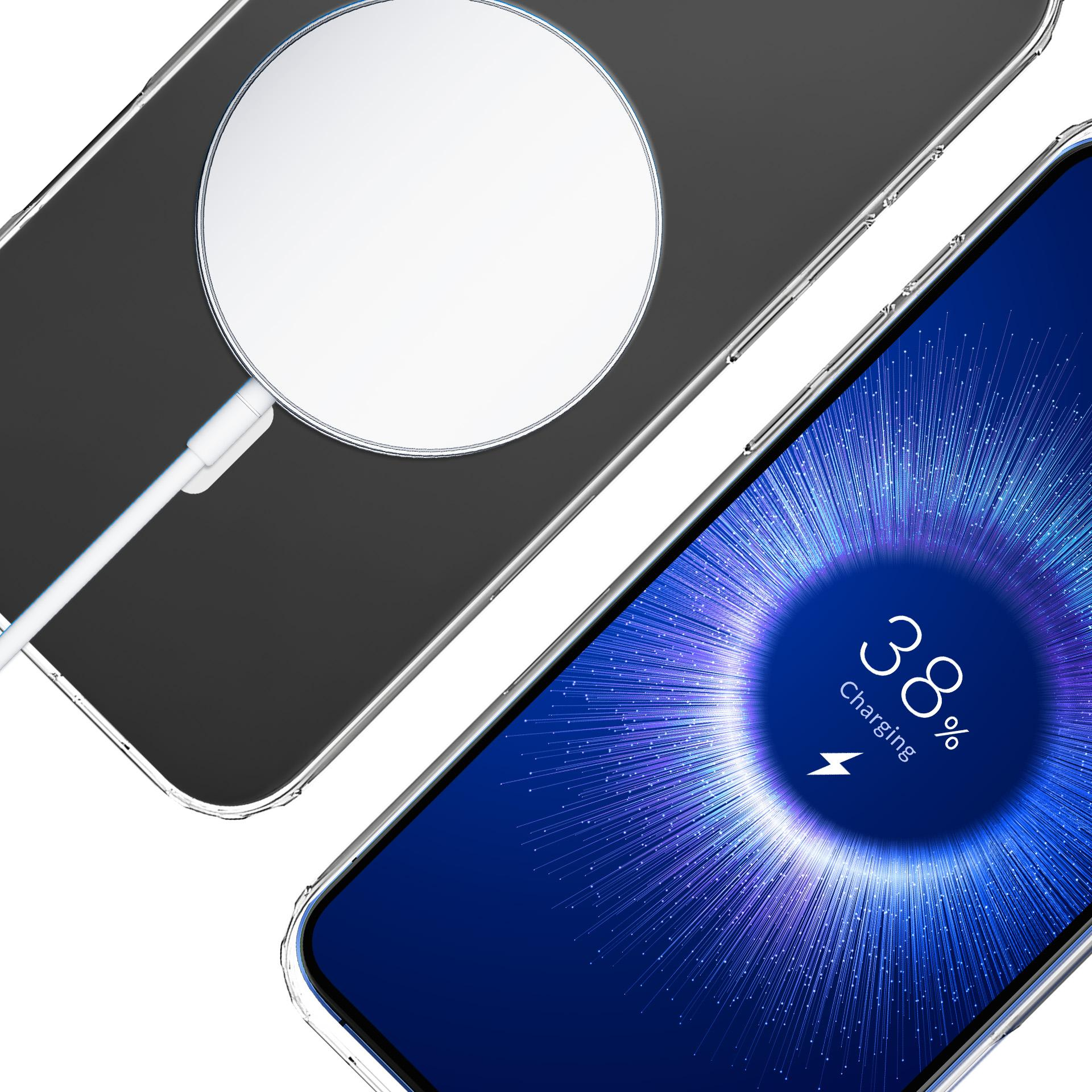 Telefon ładujący się na białej ładowarce bezprzewodowej. Ekran wyświetla procent naładowania.