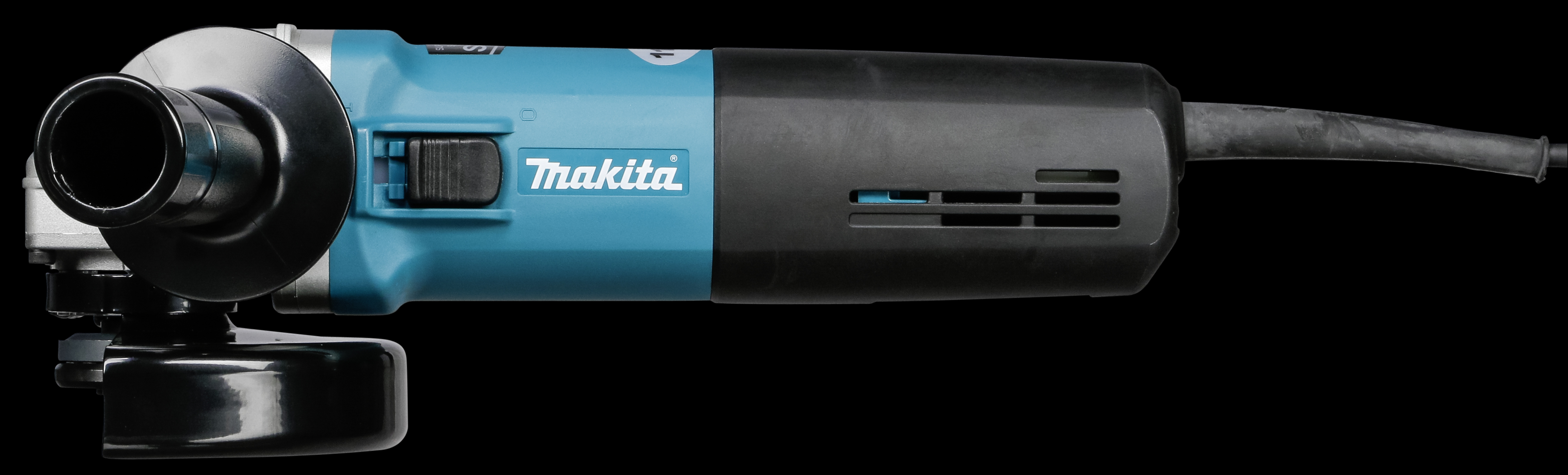 A Makita angle grinder on a black background, with the brand name printed on the tool's body.
