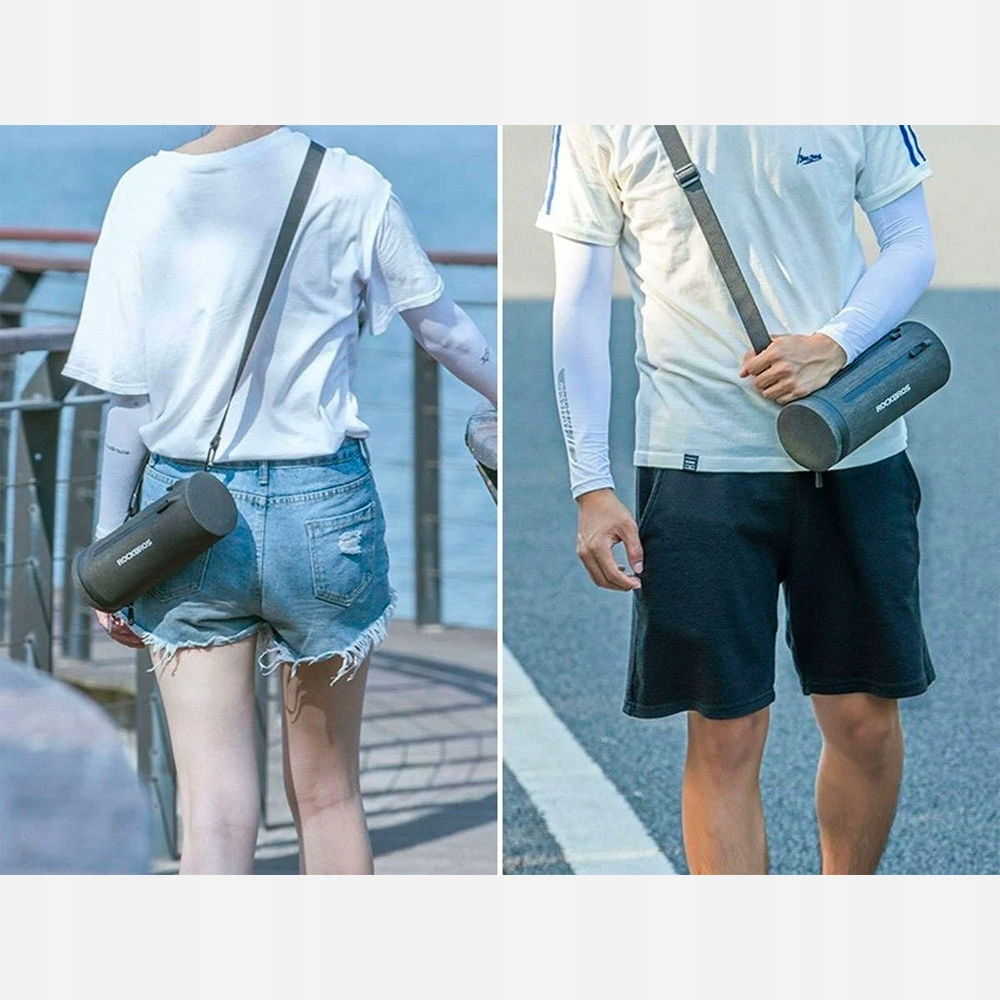 Dwie osoby niosą szare, cylindryczne torby z paskami. Jedna osoba jest po lewej.