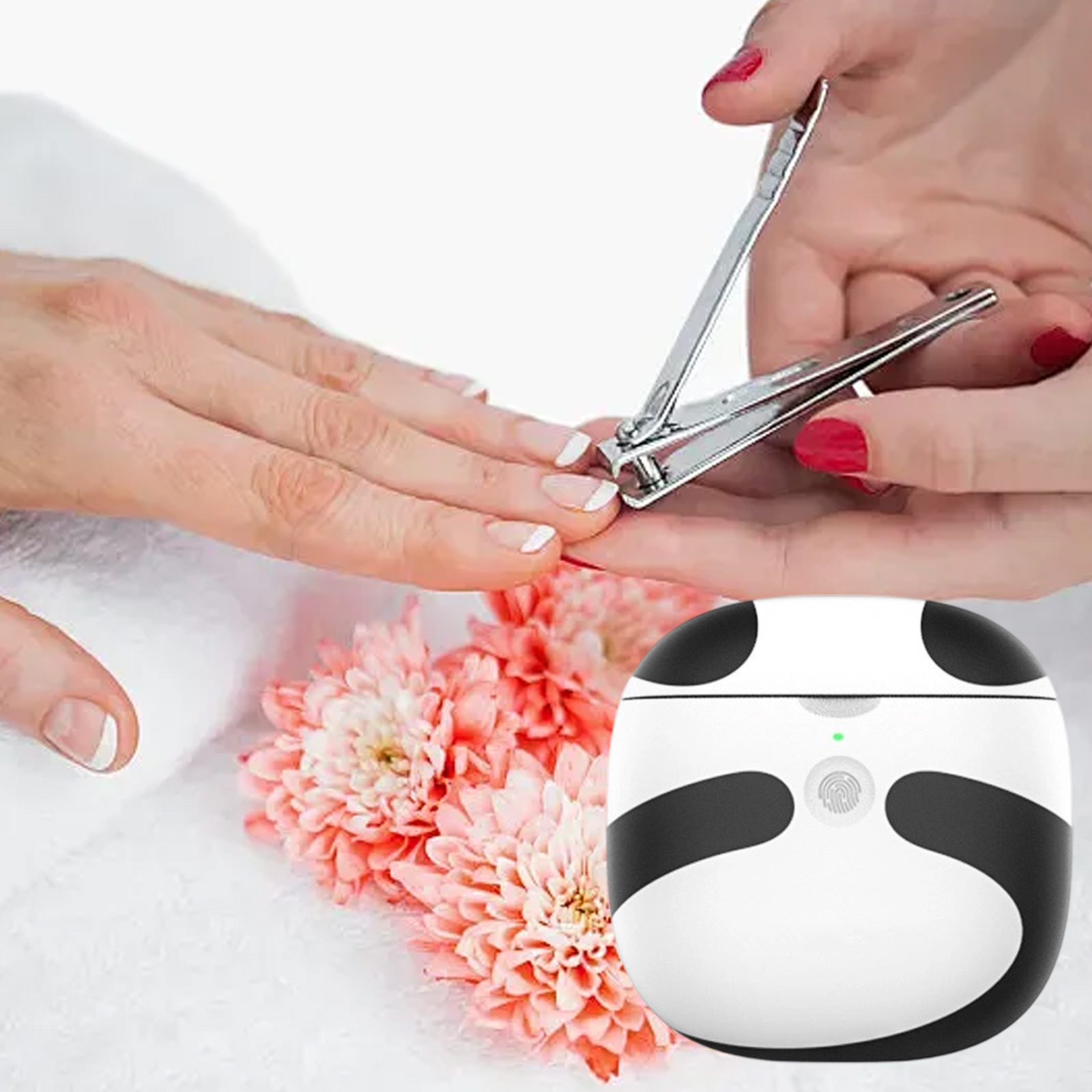 Hände halten einen Nagelknipser, mit Blumen und einem schwarz-weißen Gerät.