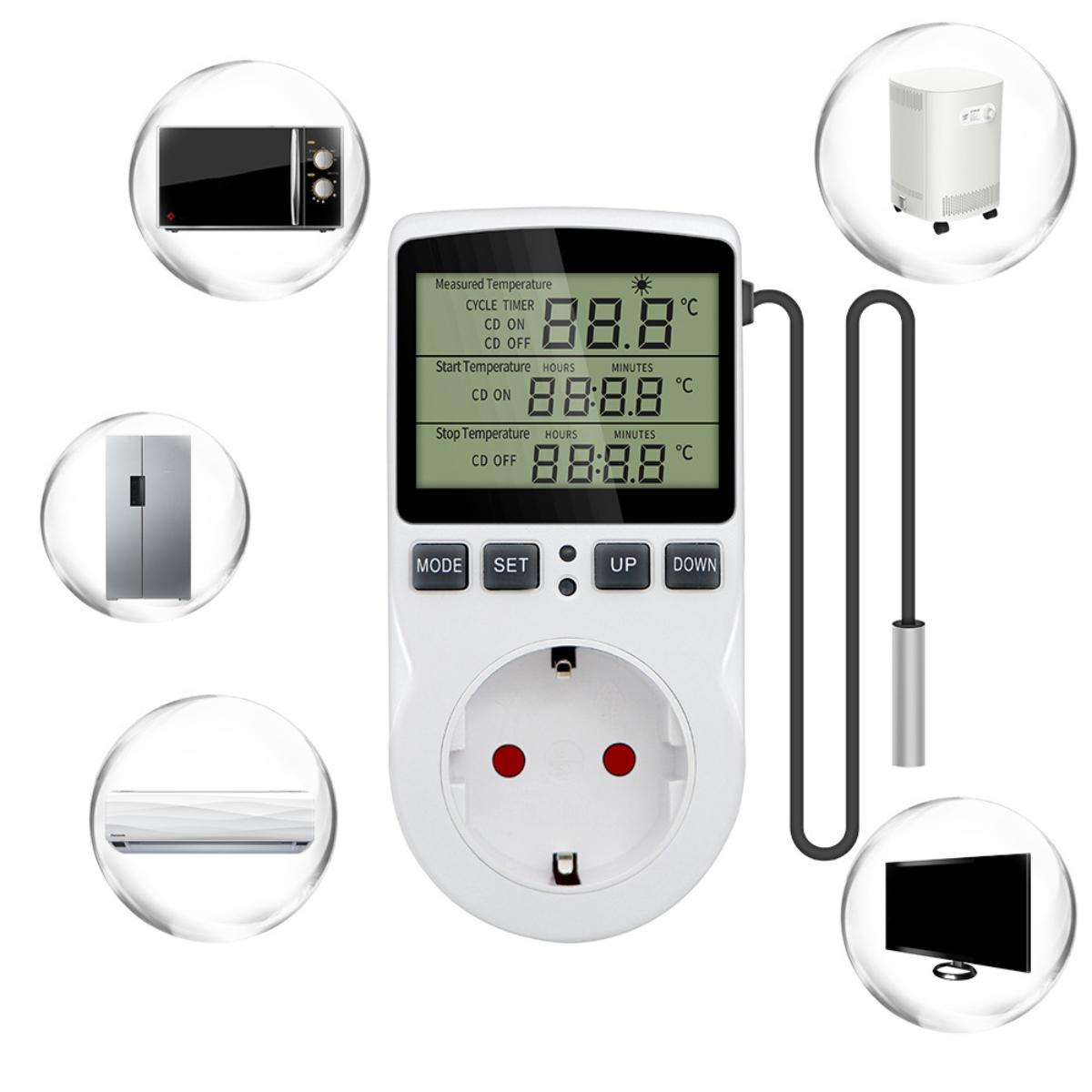 Weißer digitaler Temperaturregler mit Display und Stecker, umgeben von Geräten.
