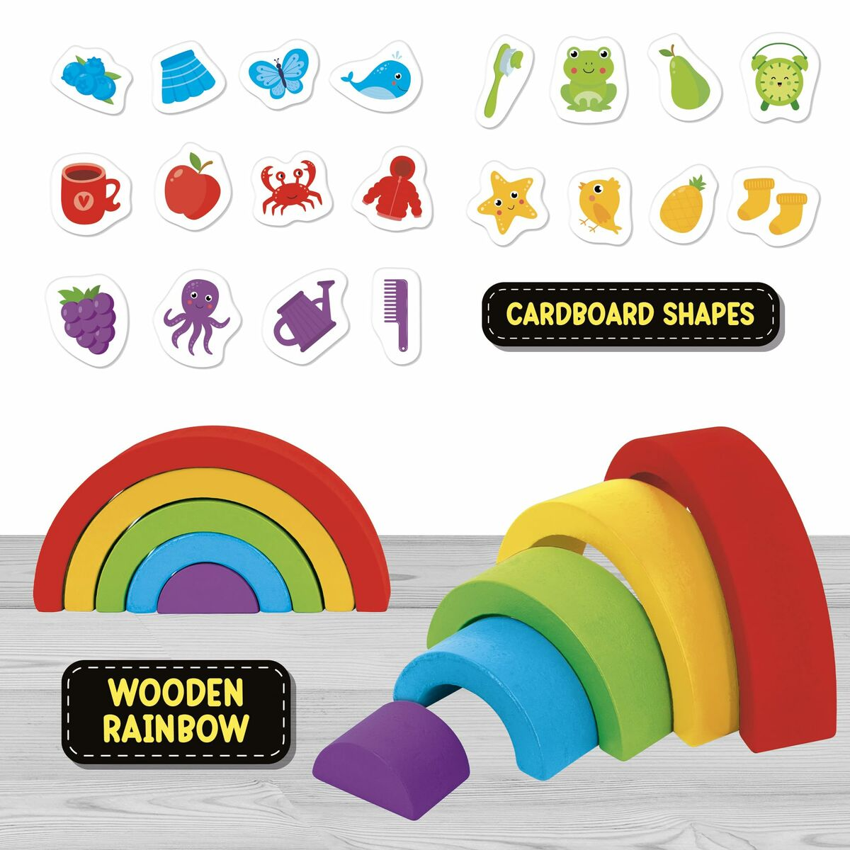 Holzregenbogen und Pappformen von Früchten, Tieren und Gegenständen.