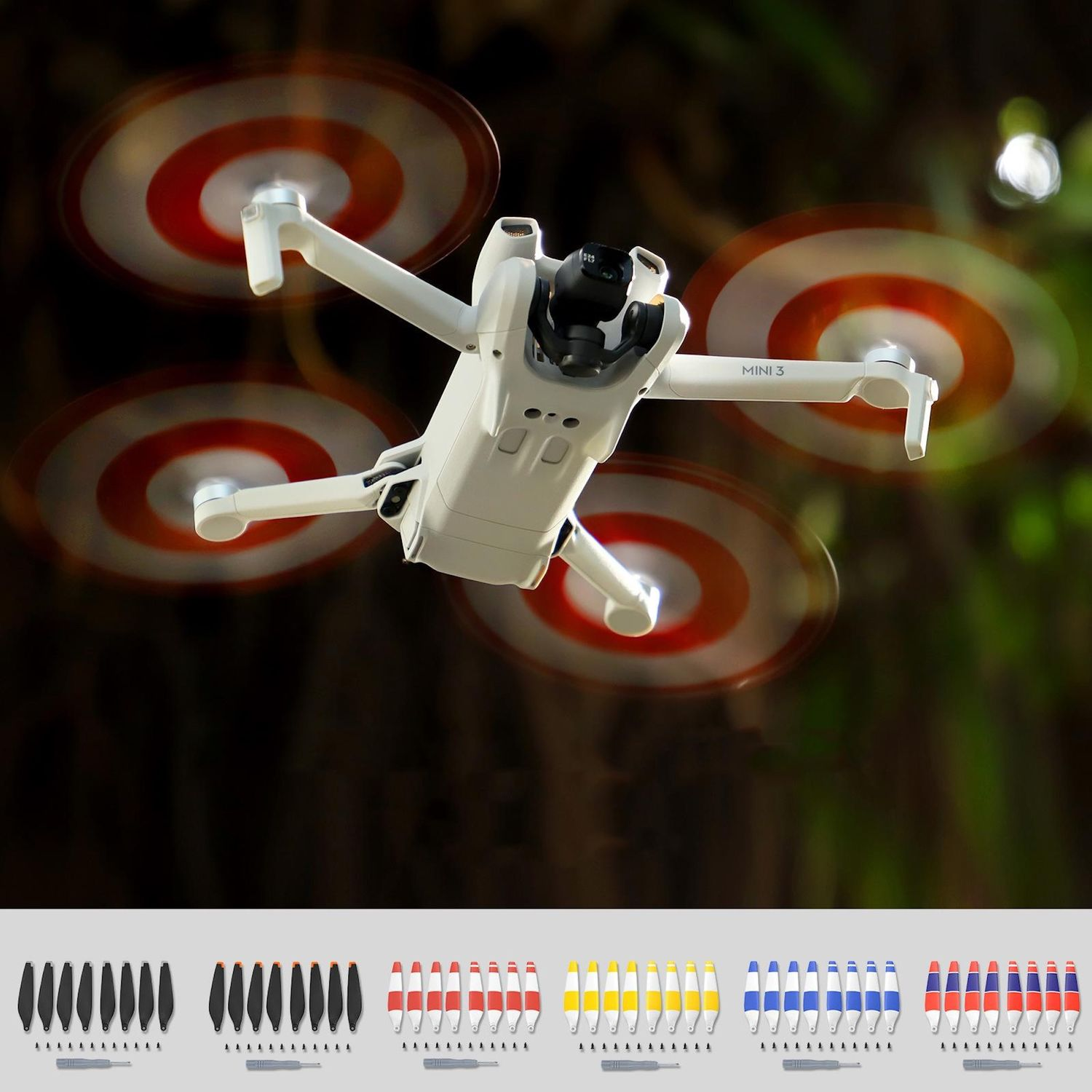 Un drone bianco con eliche rotanti. Ci sono varie eliche di ricambio sotto il drone.