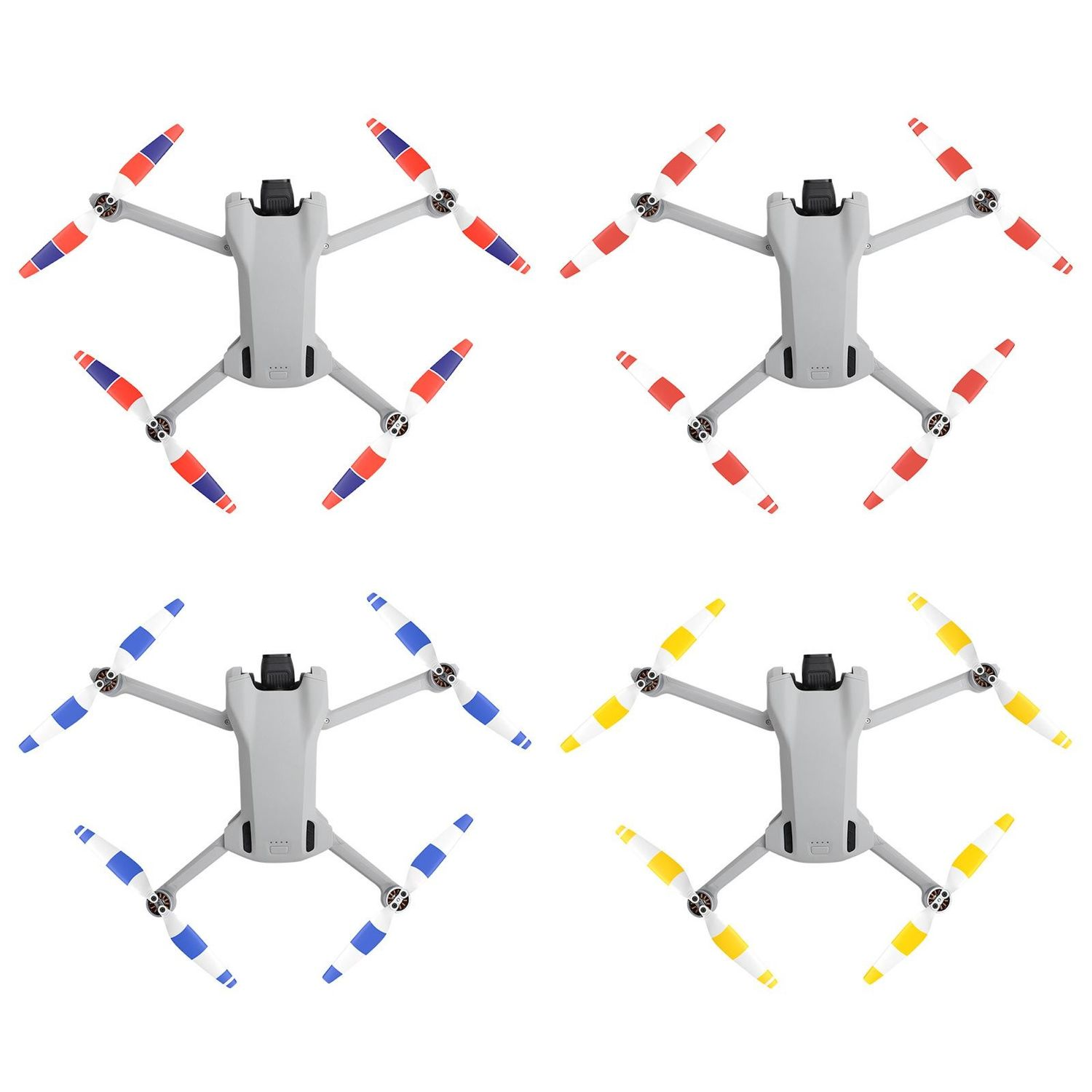 Quattro droni con eliche di colori diversi. I droni sono grigi e le eliche hanno varie combinazioni di colori.