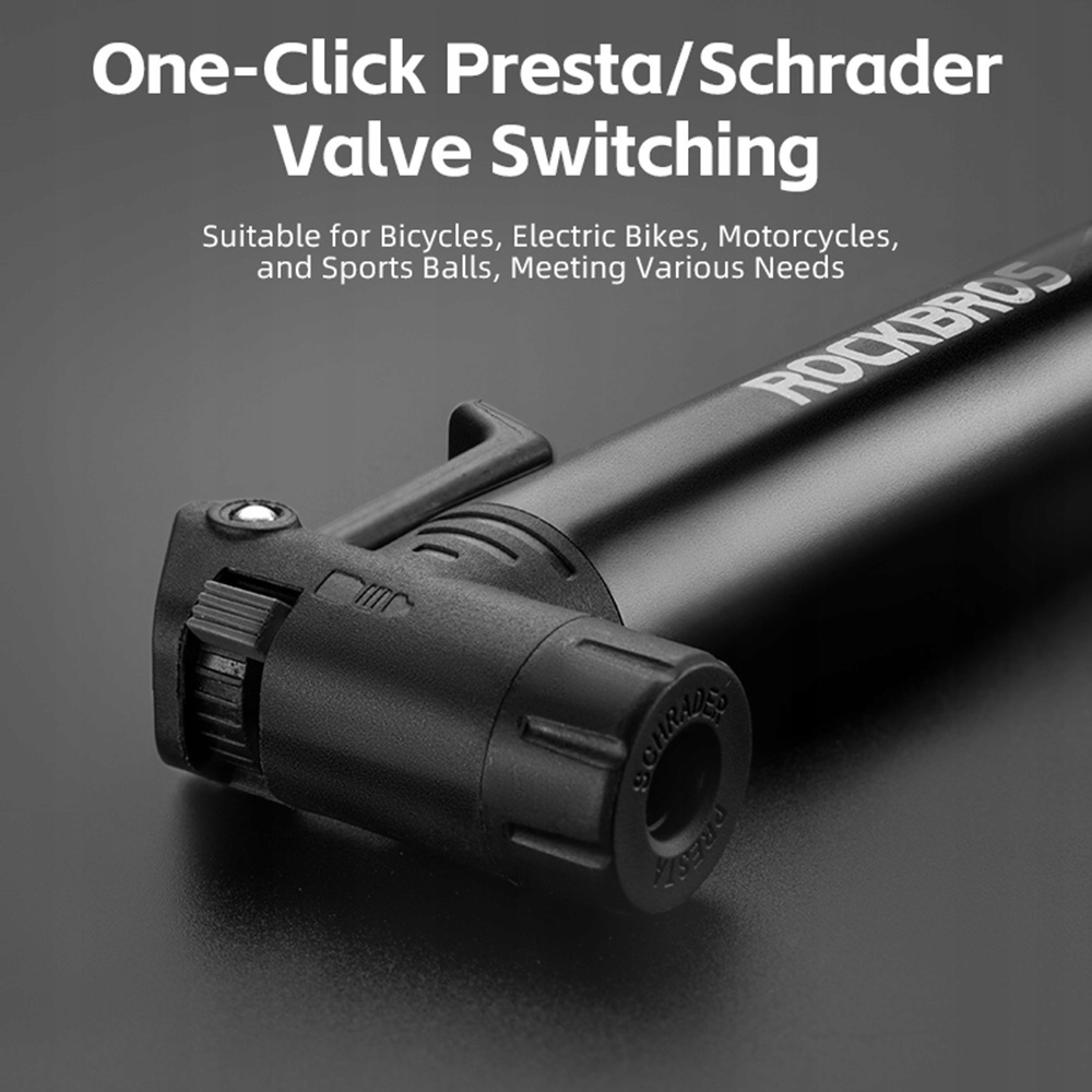Zbliżenie czarnej pompki ręcznej, pokazujące dyszę i przełącznik zaworu. Tekst: One-Click Presta/Schrader Valve Switching.