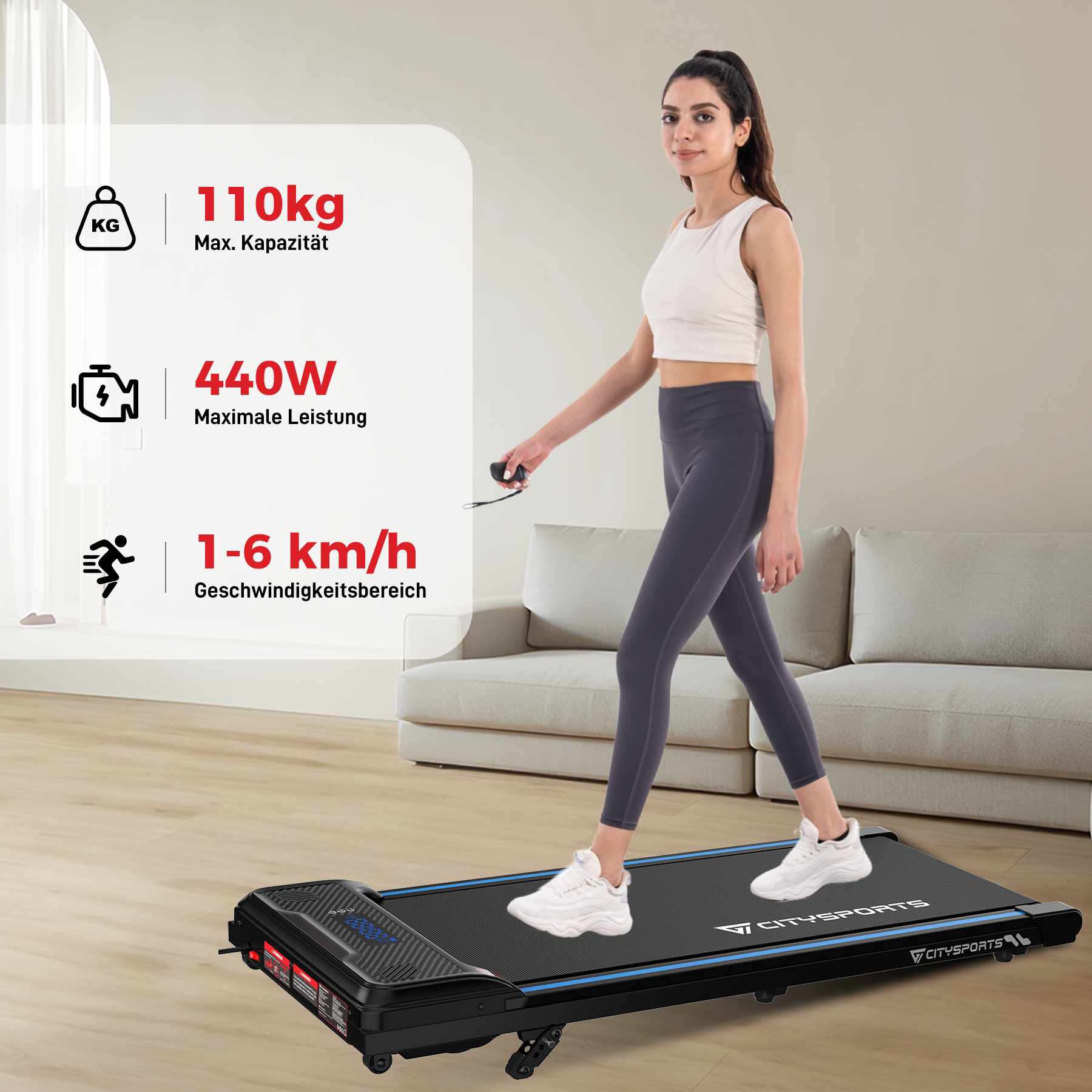 Eine Frau geht auf einem Laufband mit einer Kapazität von 110 kg und einer maximalen Leistung von 440 W, Geschwindigkeitsbereich 1-6 km/h.