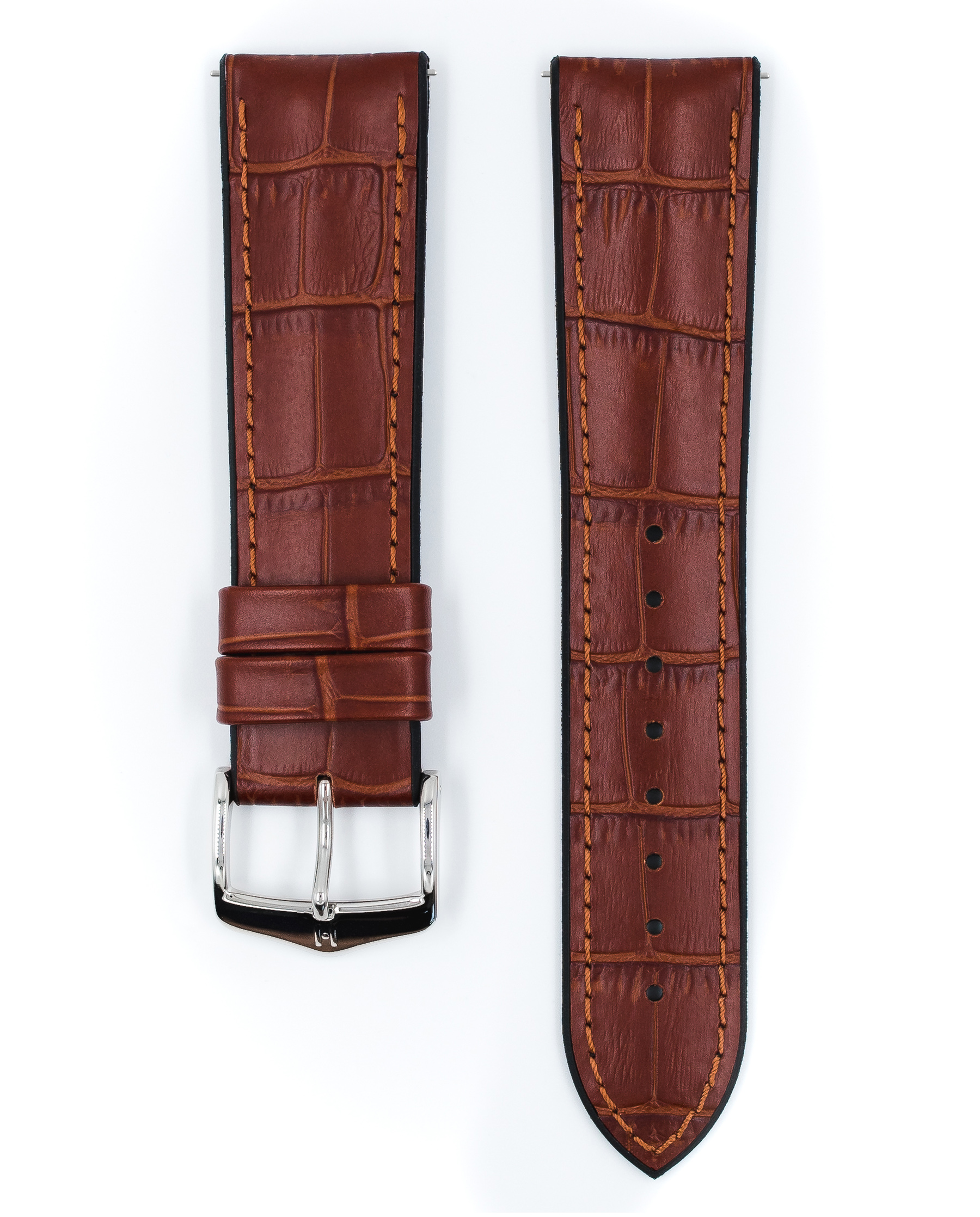 Braune Leder-Uhrenarmbänder mit weißen Nähten und silberner Schnalle. Auf weißem Hintergrund isoliert.