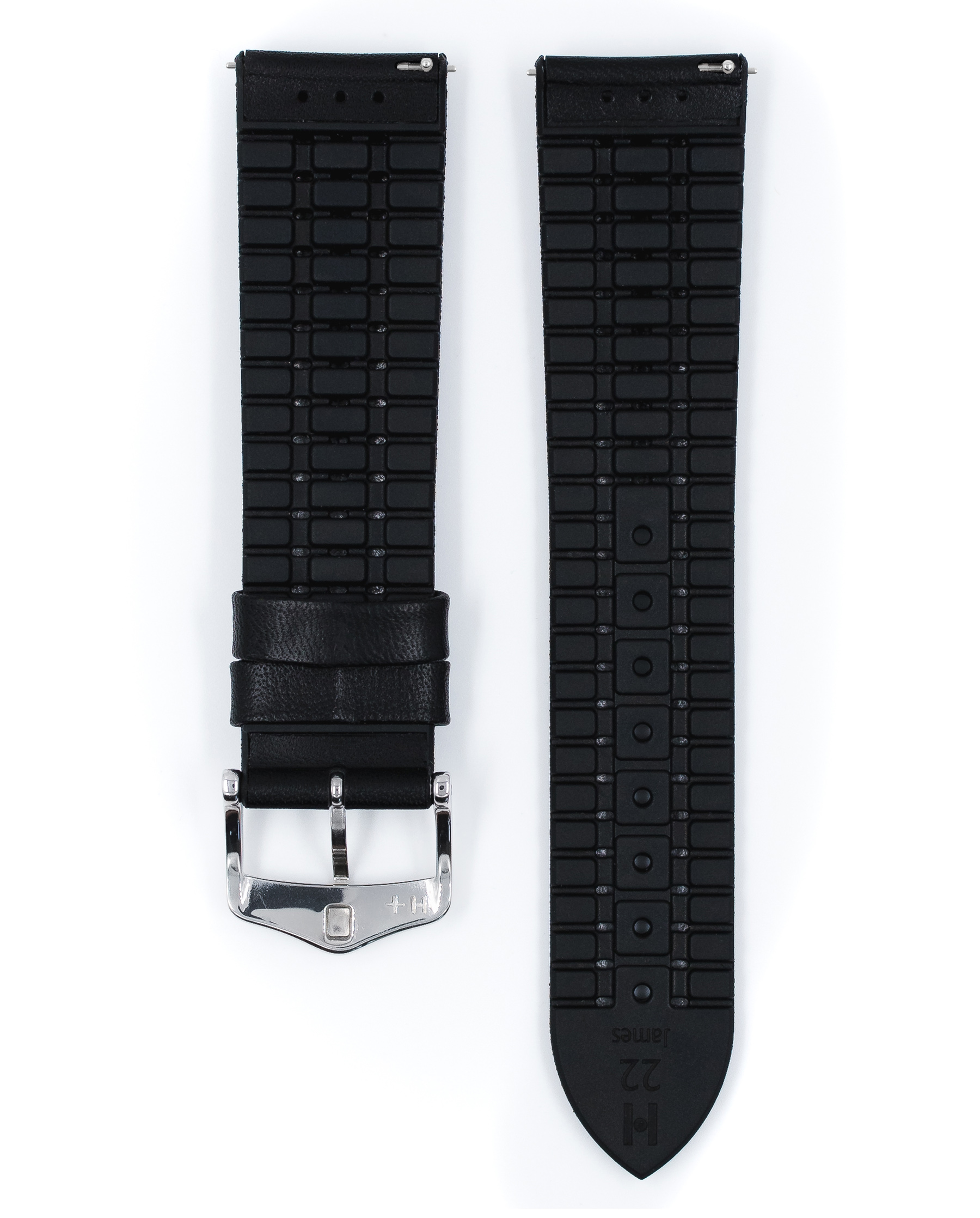Zwei schwarze Gummi-Uhrenarmbänder liegen nebeneinander auf Weiß. Eines hat eine Schnalle.