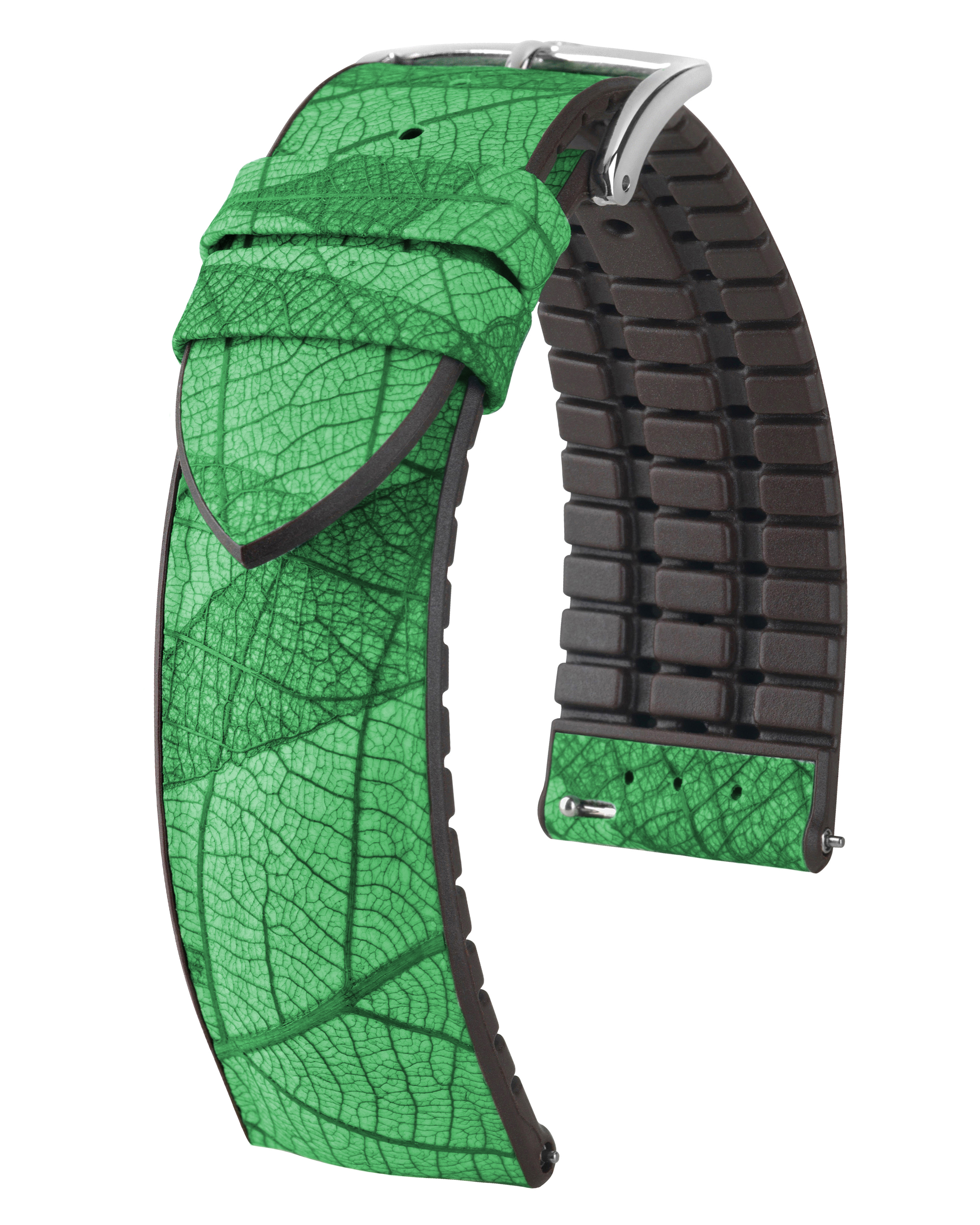 Ein grünes Uhrenarmband mit Blättermuster auf der Vorderseite und braunem Gummi auf der Rückseite.