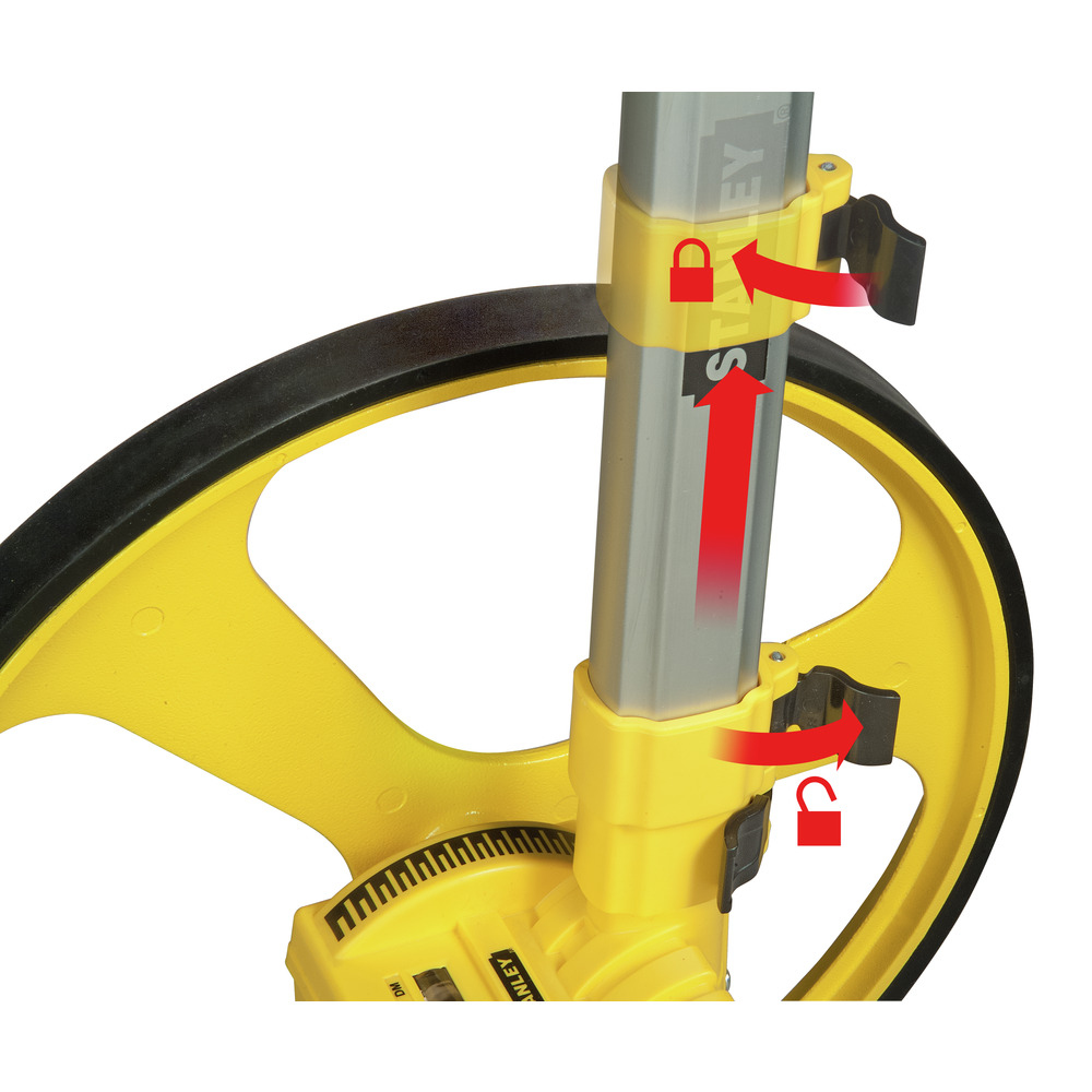 Nahaufnahme des Stanley-Messrads. Zeigt den Verriegelungsmechanismus mit rotem Pfeil. Gelb und schwarz.
