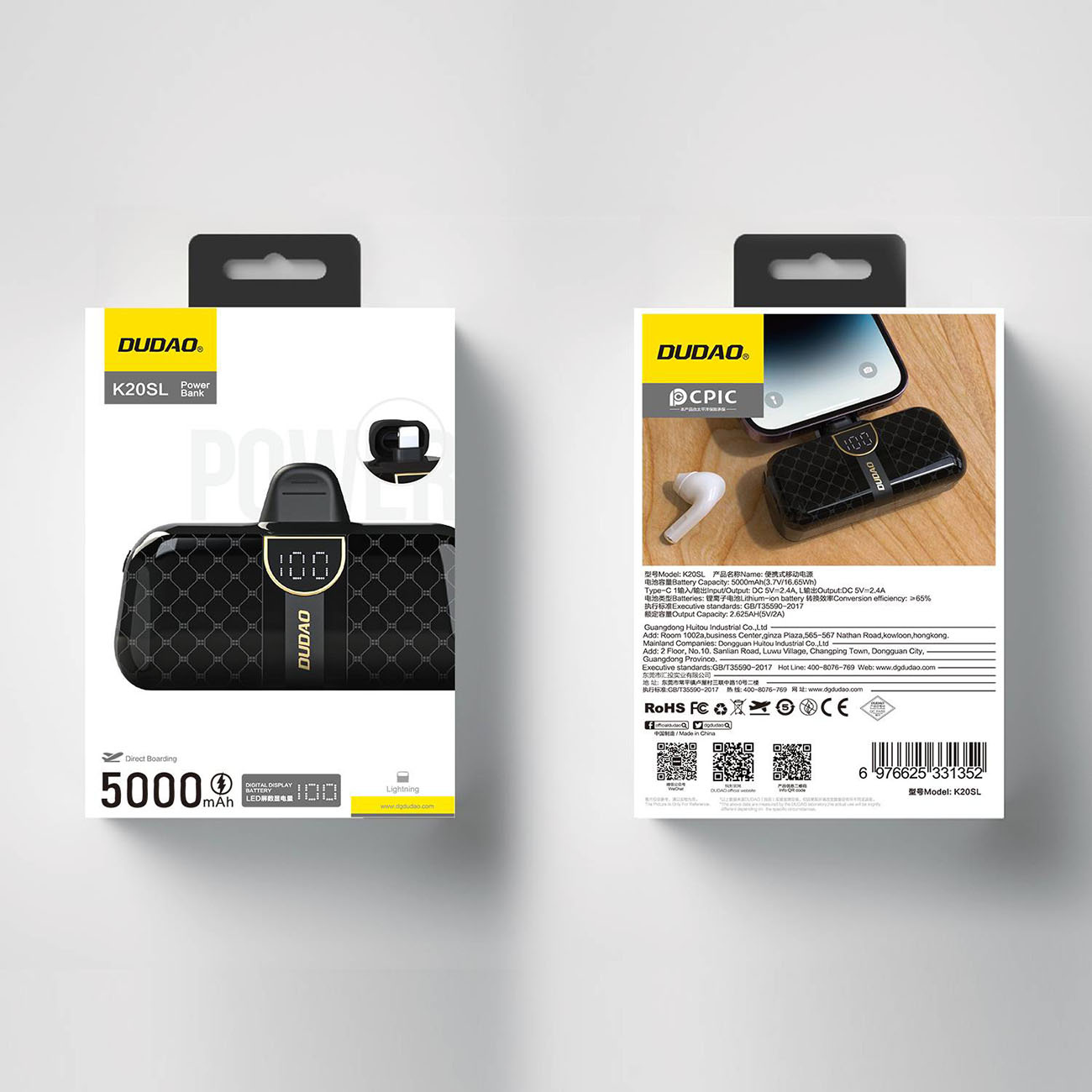 Dwa pudełka z produktami, power bank i drugi z telefonem.