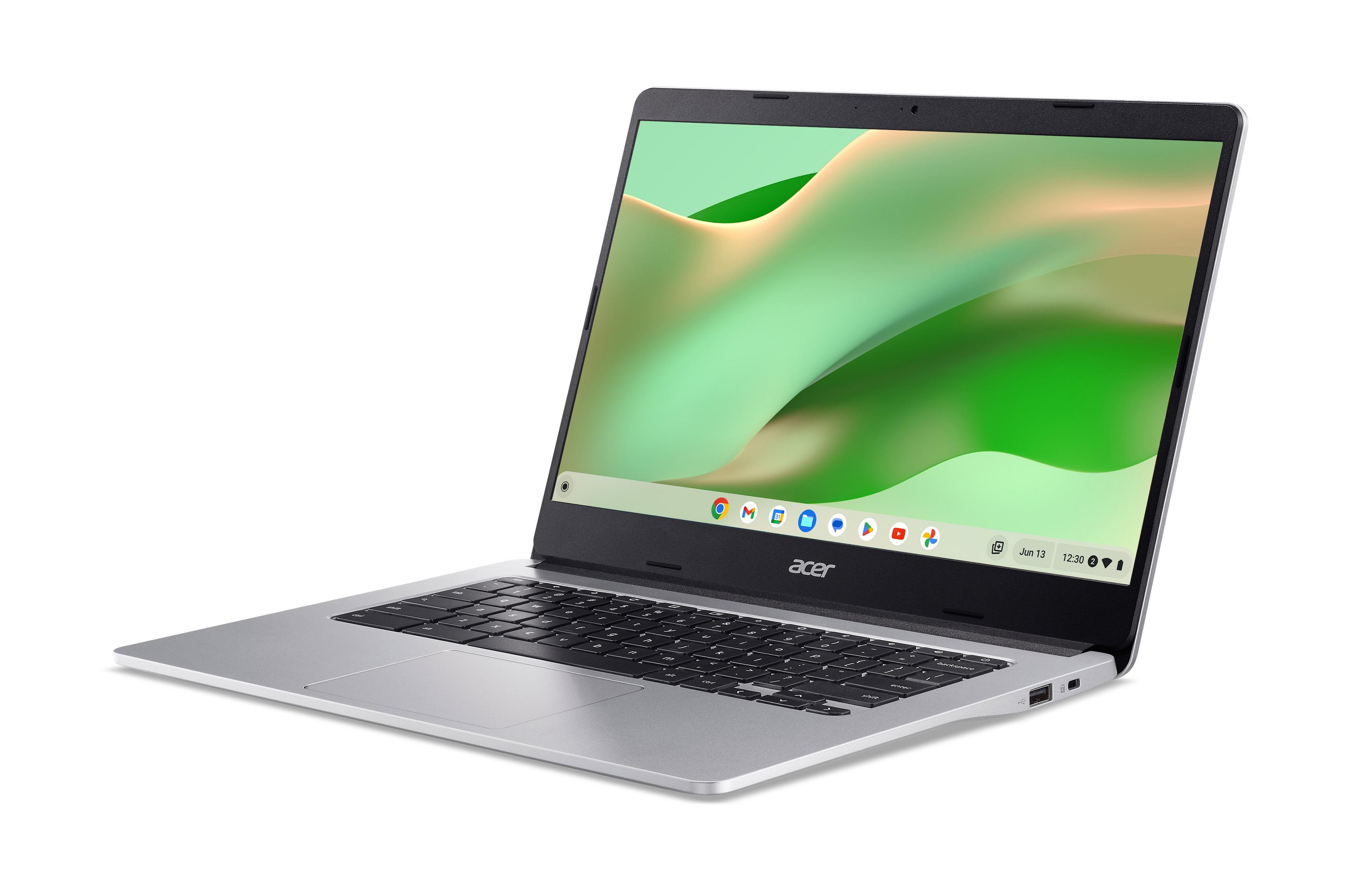 Ein silbernes Acer Chromebook Laptop, in einem Winkel geöffnet. Der Bildschirm zeigt ein grün-weißes Muster.