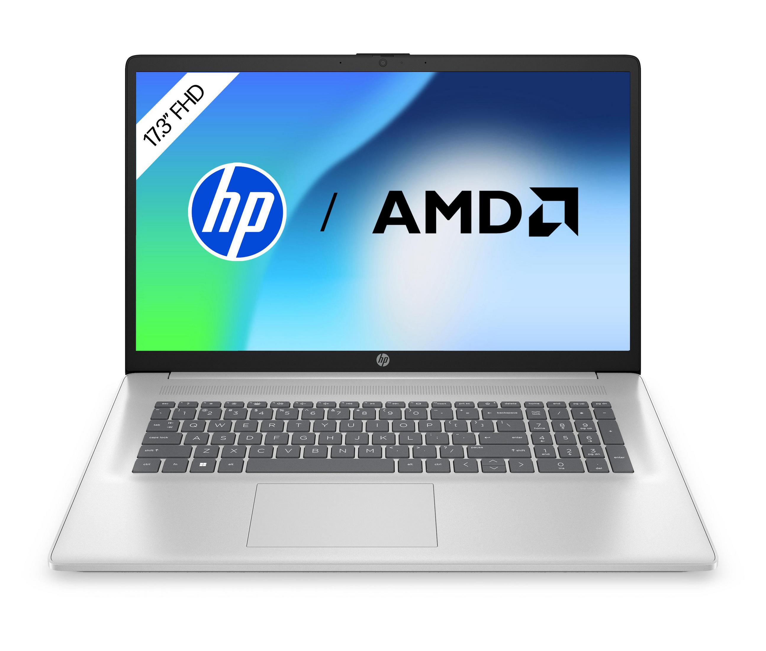 Ein silberner HP Laptop mit großem Bildschirm, der die HP- und AMD-Logos zeigt. Die Tastatur ist sichtbar.