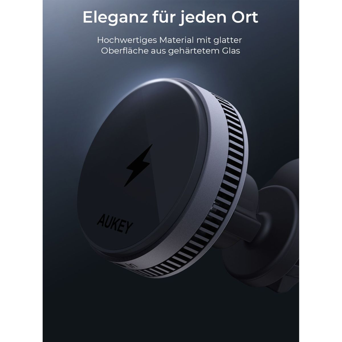 Nahaufnahme einer schwarzen Autotelefonhalterung mit dem AUKEY-Logo auf dunklem Hintergrund, mit Text.