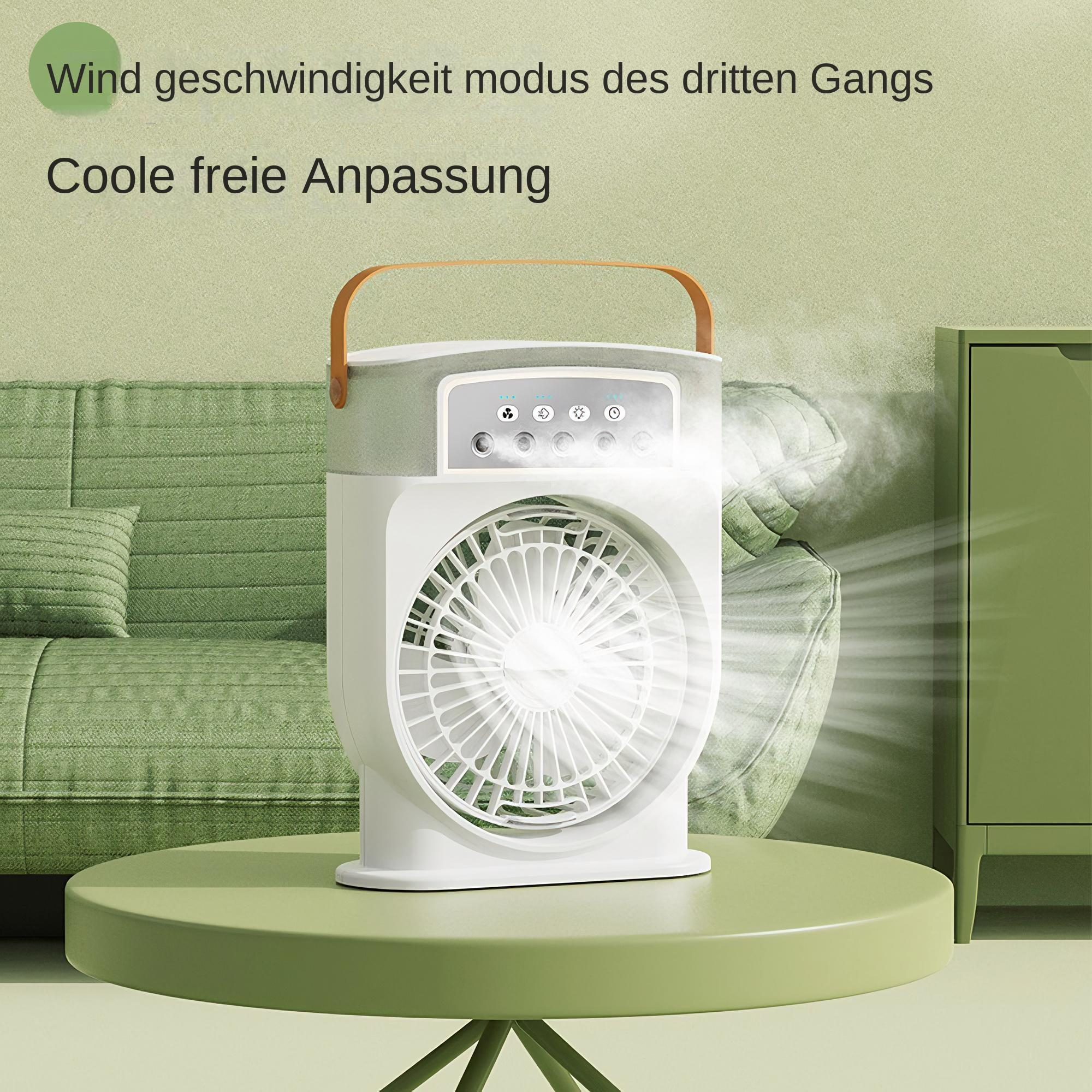 Ein weiß-grüner Ventilator auf einem grünen Tisch, mit Griff und Bedienfeld sichtbar.