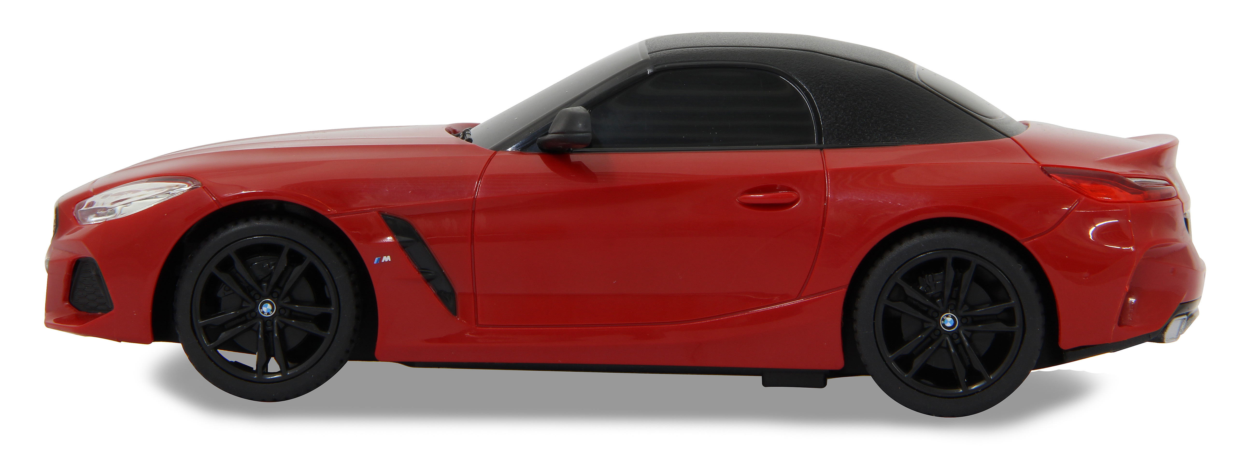 Seitenansicht eines roten BMW Z4 Modellautos mit schwarzem Dach und Rädern, auf Weiß.
