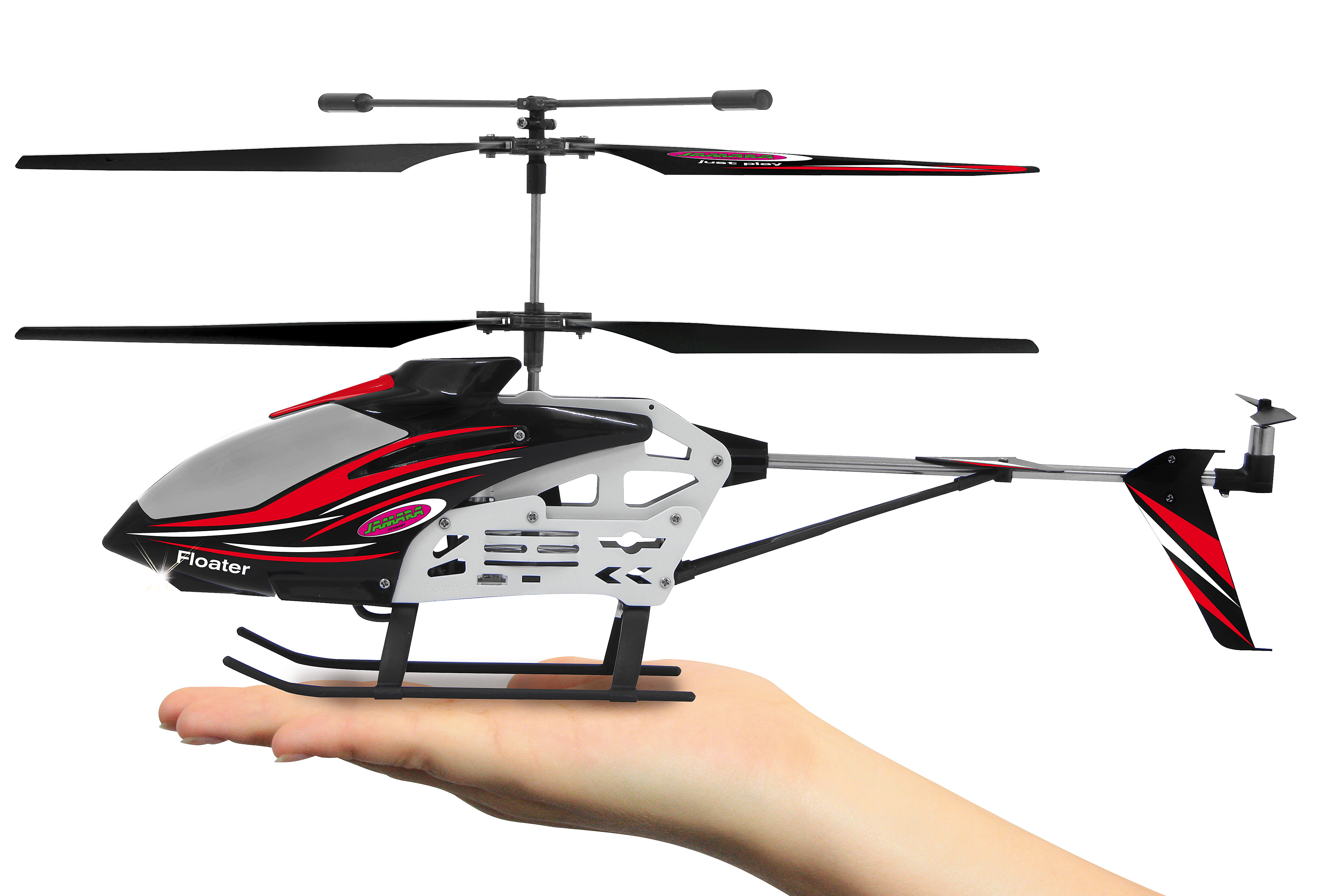 Eine Hand, die einen Spielzeughelikopter hält. Der Helikopter hat schwarze, graue und rote Farben.