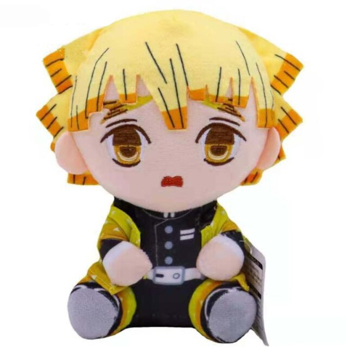 Plüschtier eines Anime-Charakters mit gelben Haaren und traurigem Blick.
