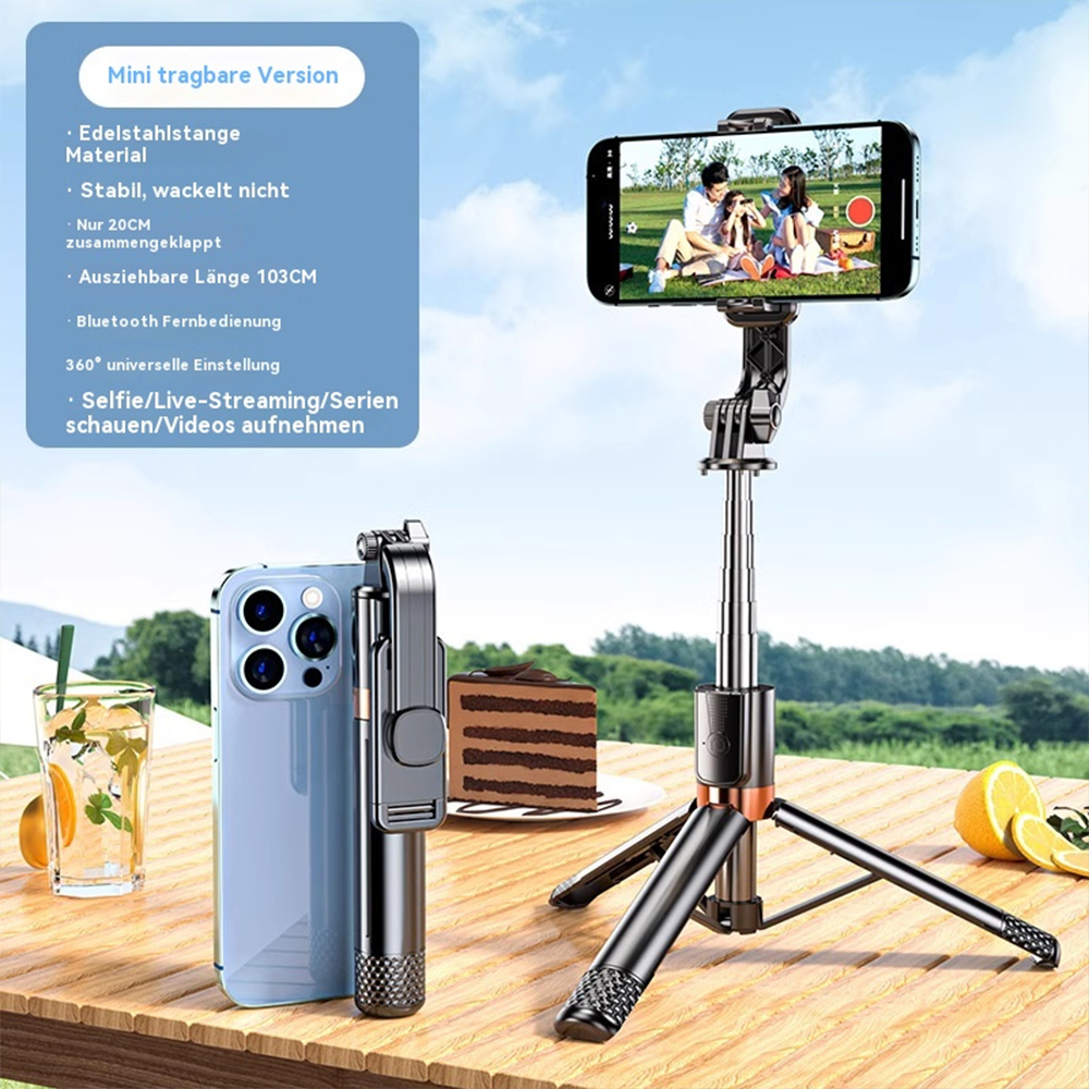 Ein Selfie-Stick mit Telefon und ein Telefon auf einem Tisch mit Kuchen.