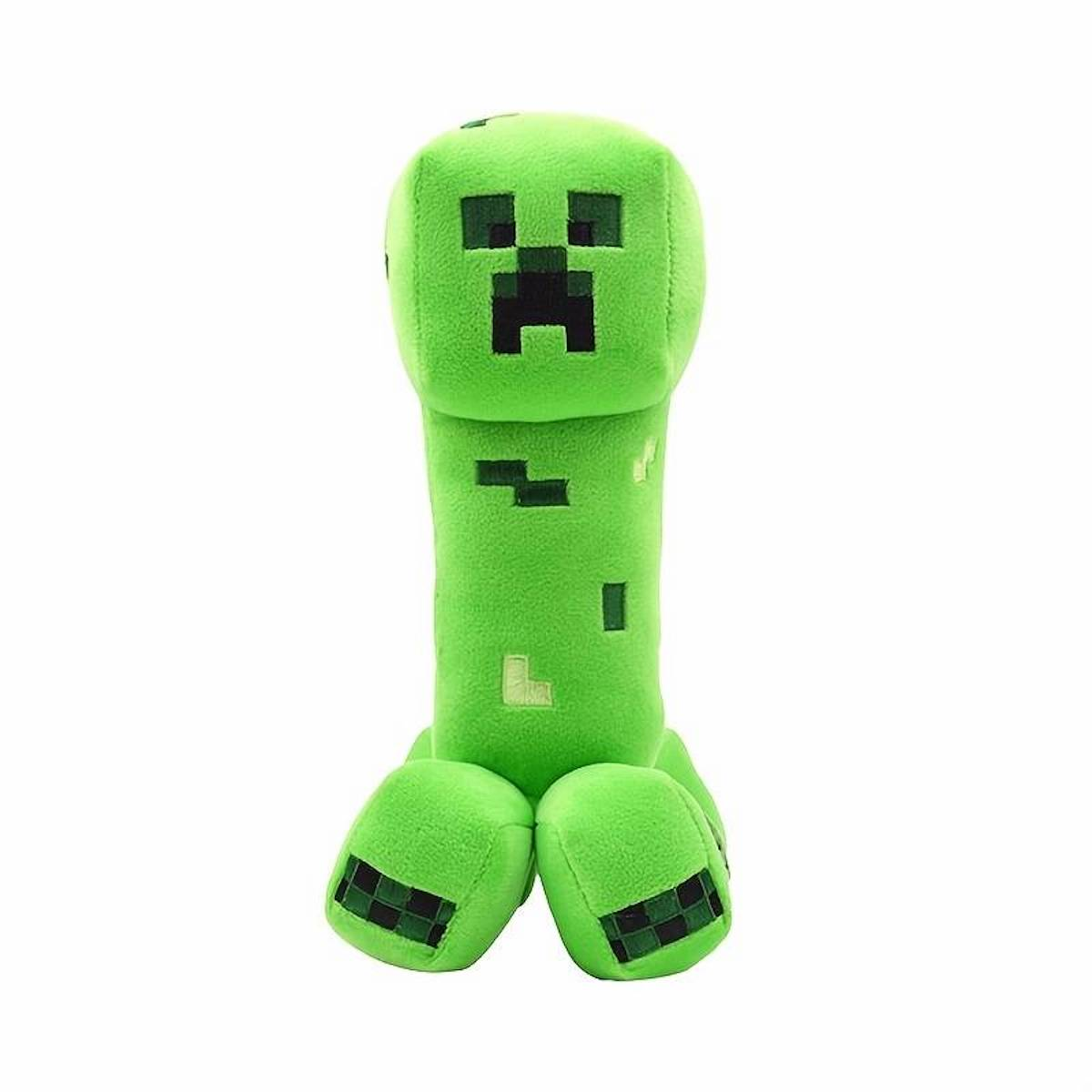 Ein grünes Minecraft Creeper Plüschtier. Es hat einen quadratischen Kopf und einen langen Körper. Der Hintergrund ist weiß.