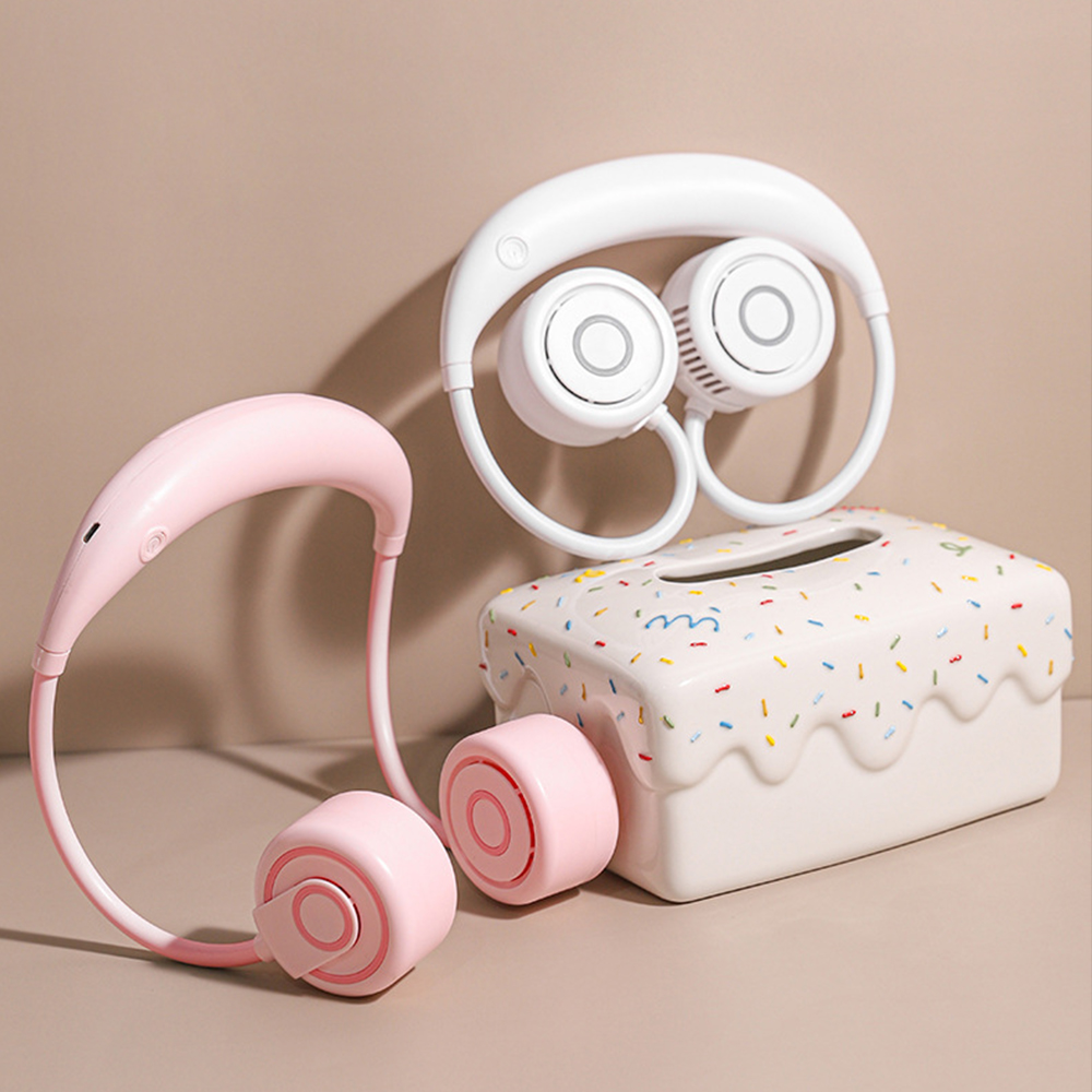 Rosa und weißer persönlicher Ventilator, Taschentuchbox.