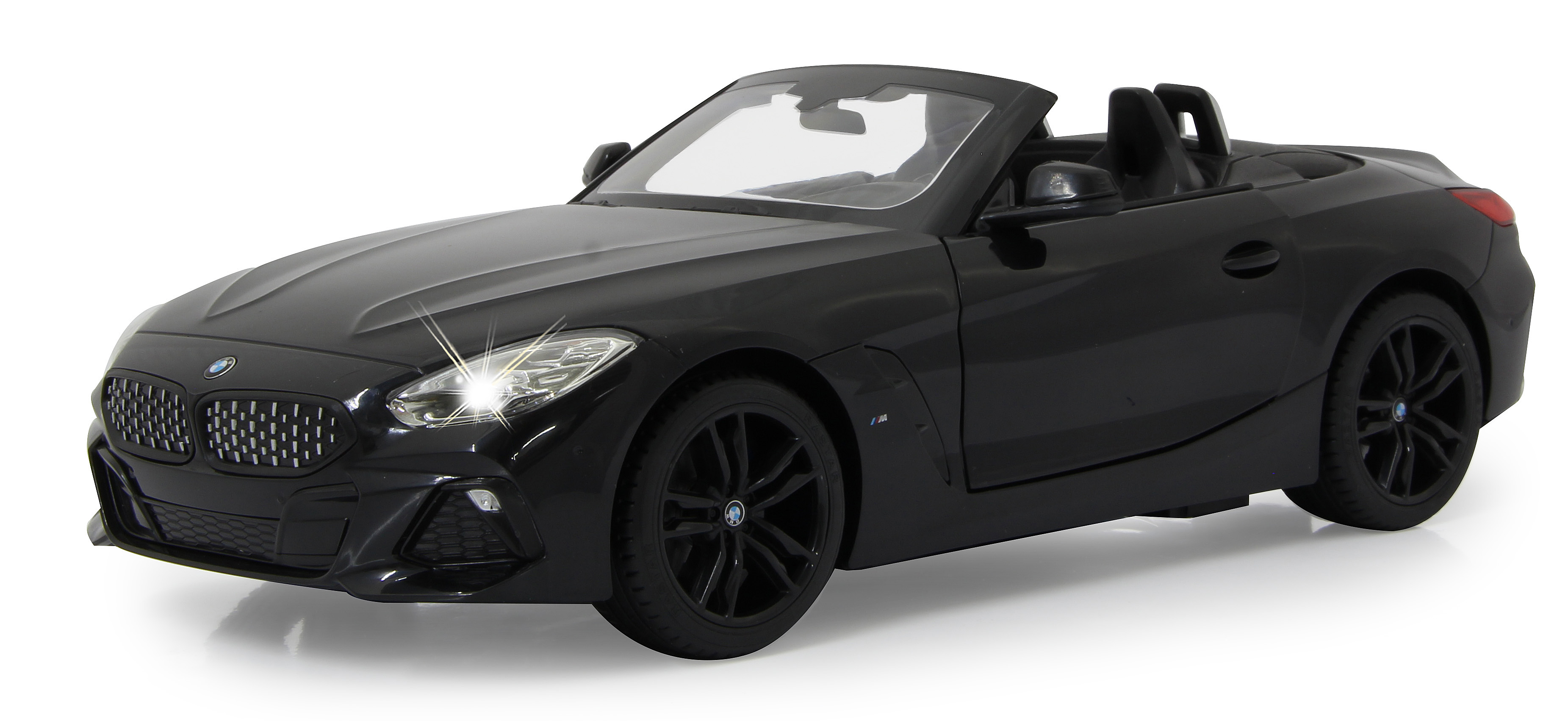 Schwarzes BMW Z4-Spielzeugauto. Weißer Hintergrund.