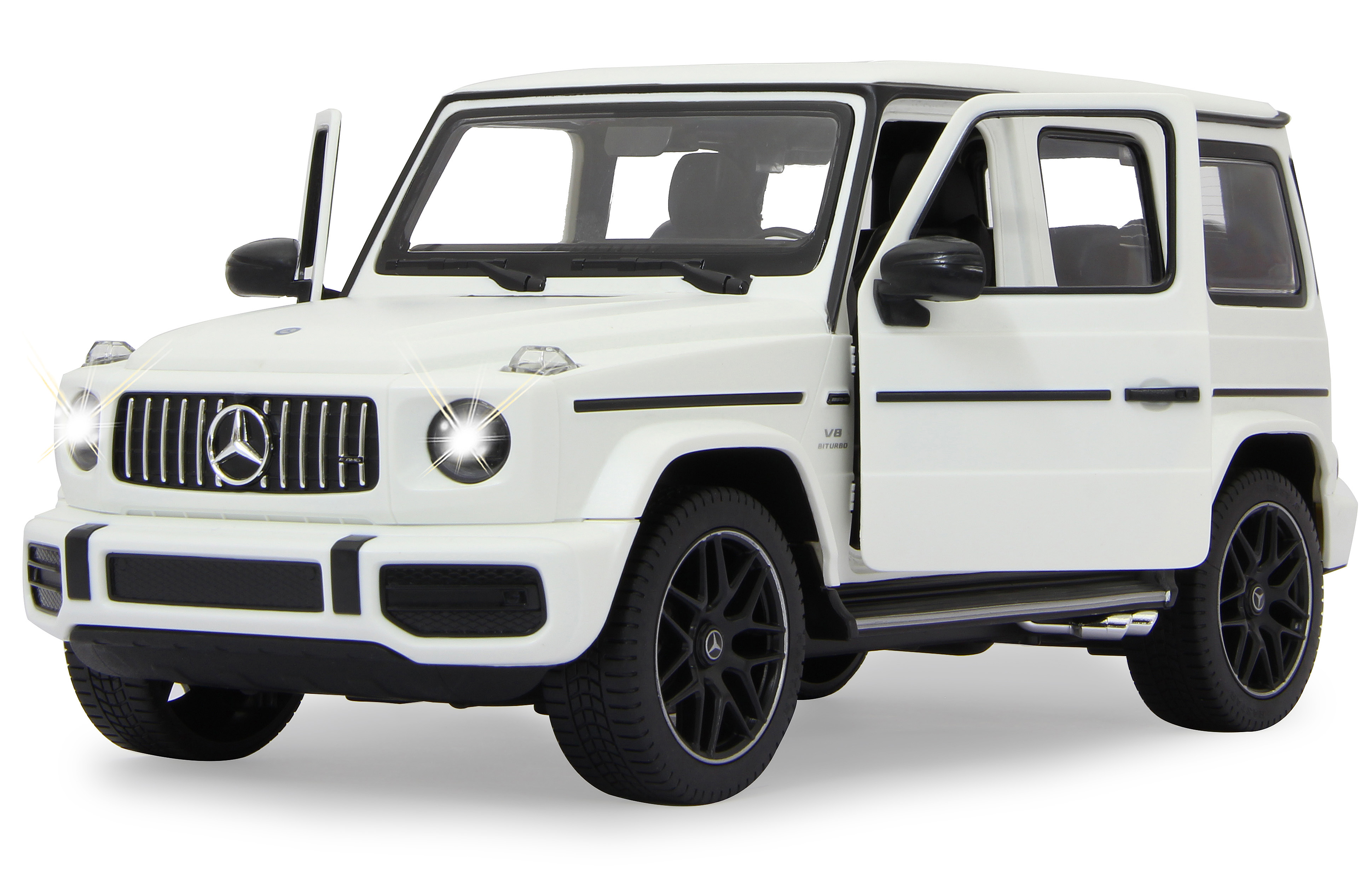 Weißes Spielzeug Mercedes G-Wagon mit offenen Türen und eingeschalteten Scheinwerfern.