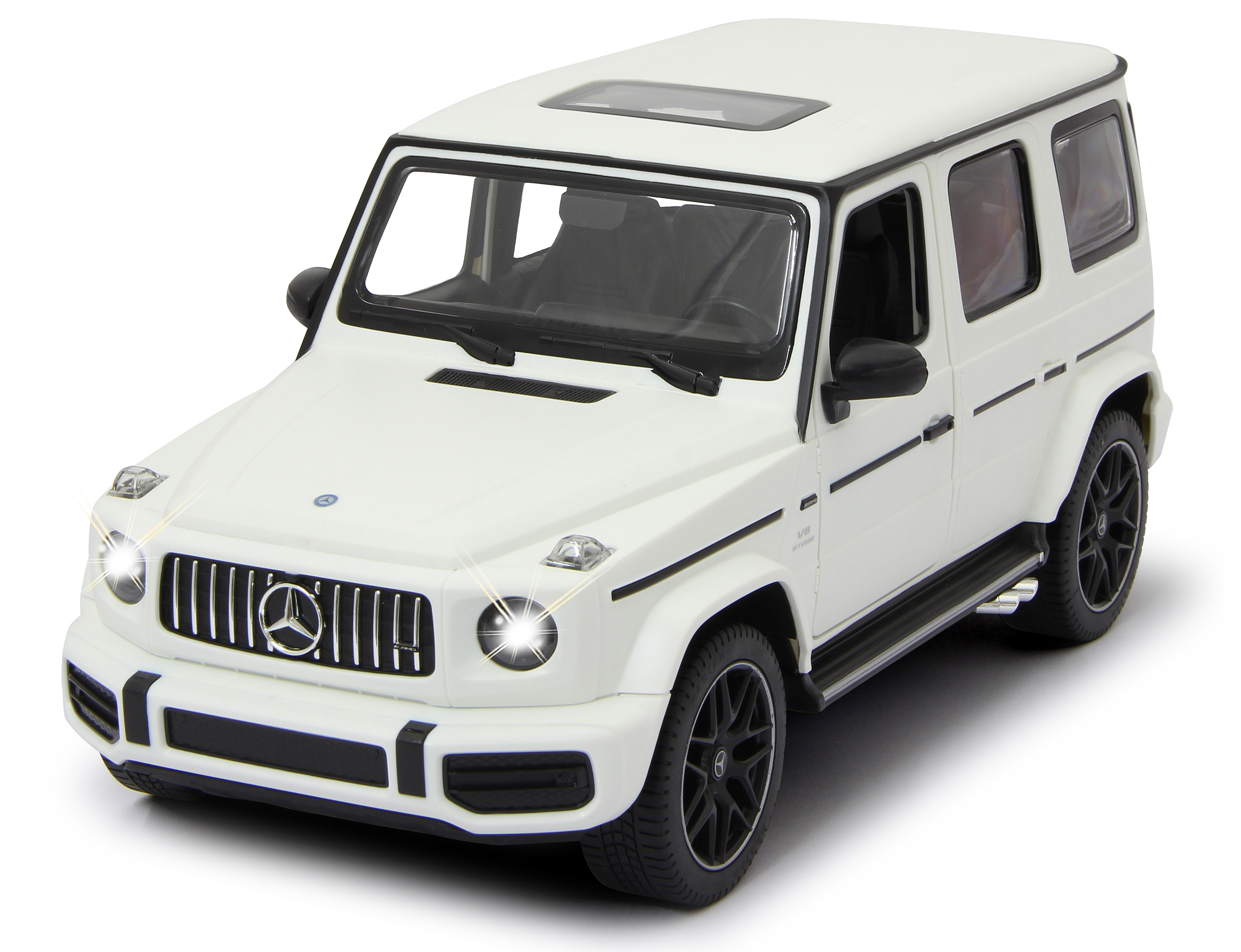 Weißes Spielzeug Mercedes G-Wagon mit Lichtern, schräge Ansicht.