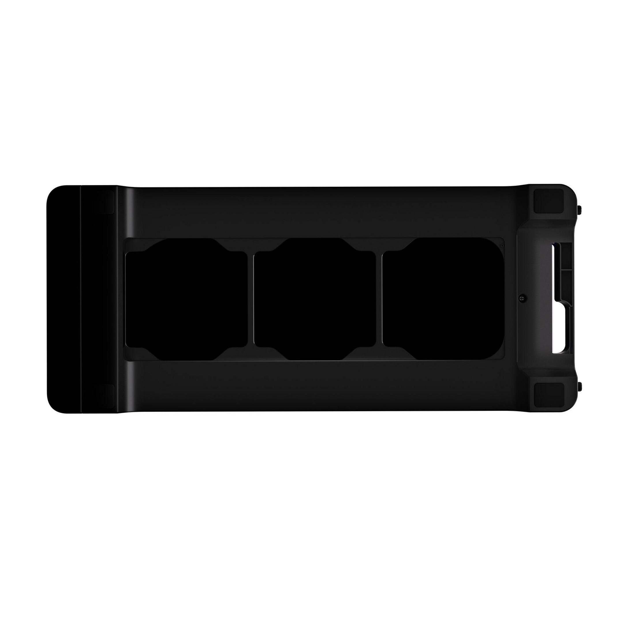 Czarna obudowa komputera z góry, pokazująca trzy otwory wentylacyjne.