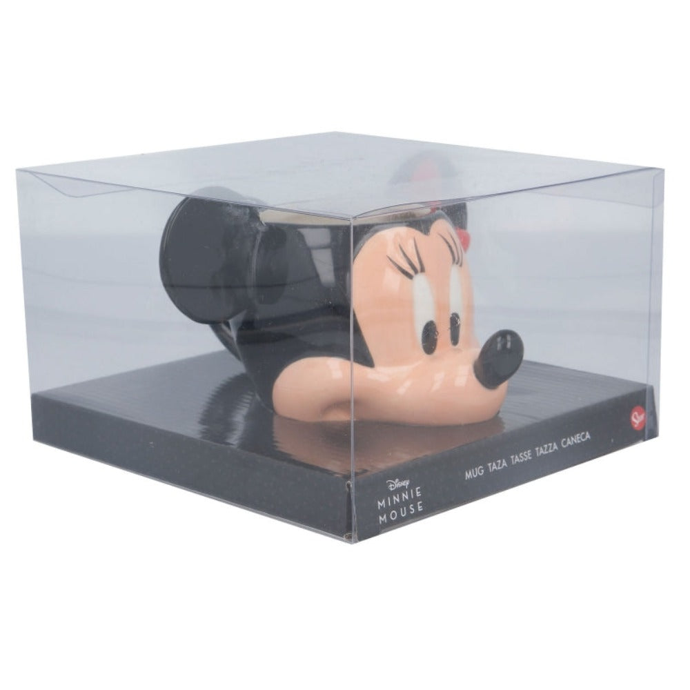 Taza de Minnie Mouse en una caja transparente, con su cara, colores negro, beige y rojo.