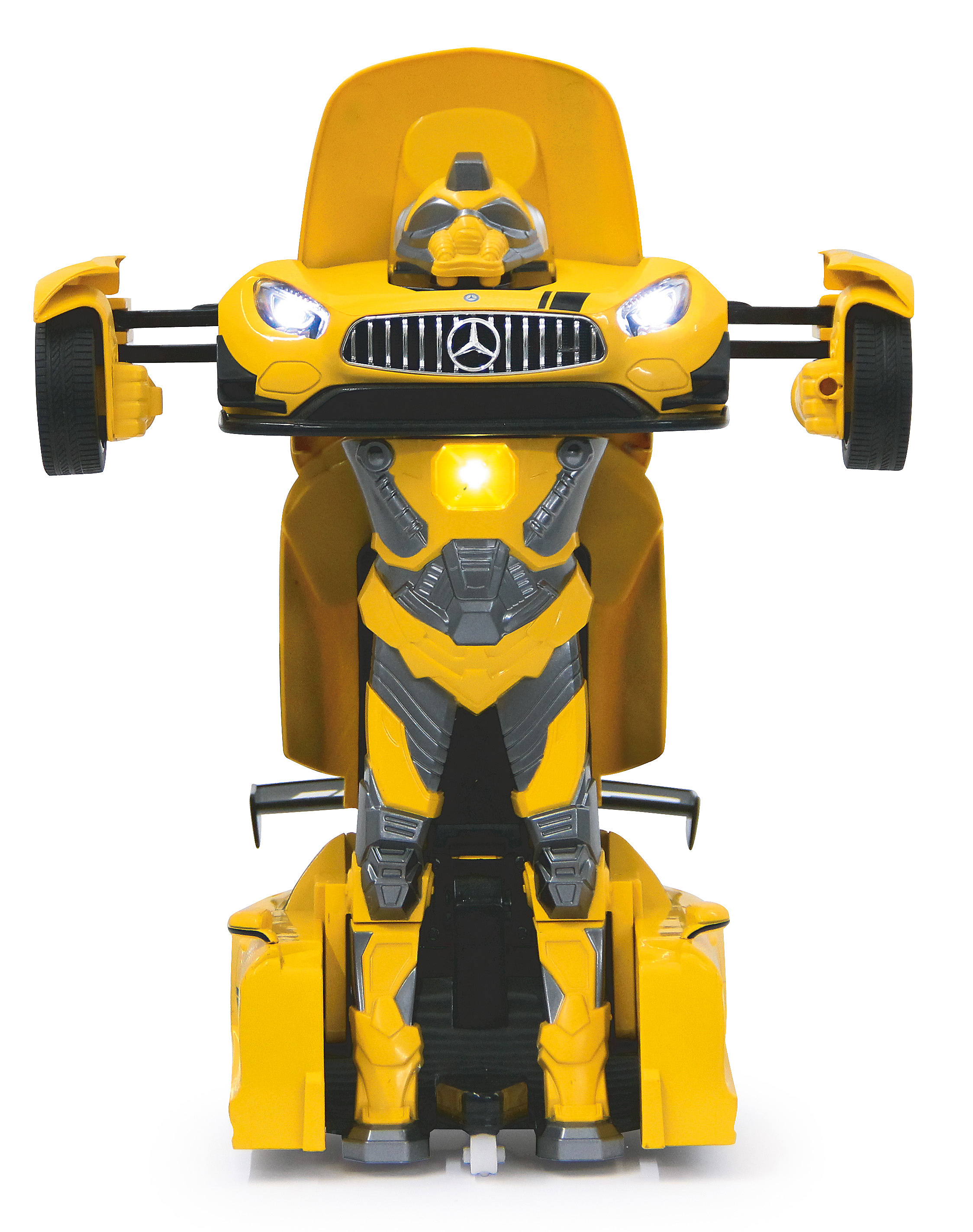 Gelbes Roboter-Spielzeug in Autoform. Das Spielzeug hat Scheinwerfer und ein Mercedes-Benz-Logo. Weißer Hintergrund.