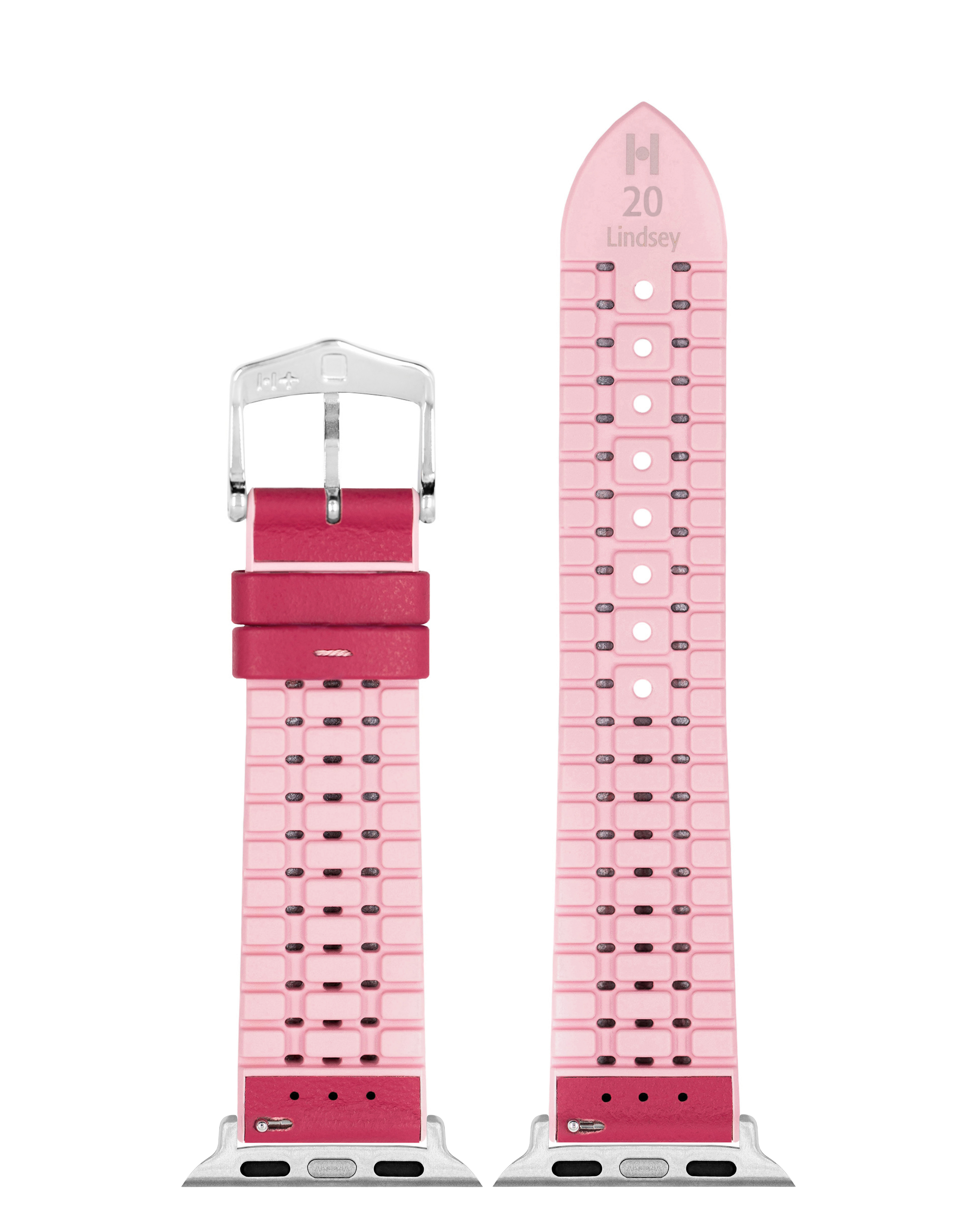 Hellrosa Uhrenarmband mit silberner Schnalle und rosa Nähten. Schwarze Löcher und Text.