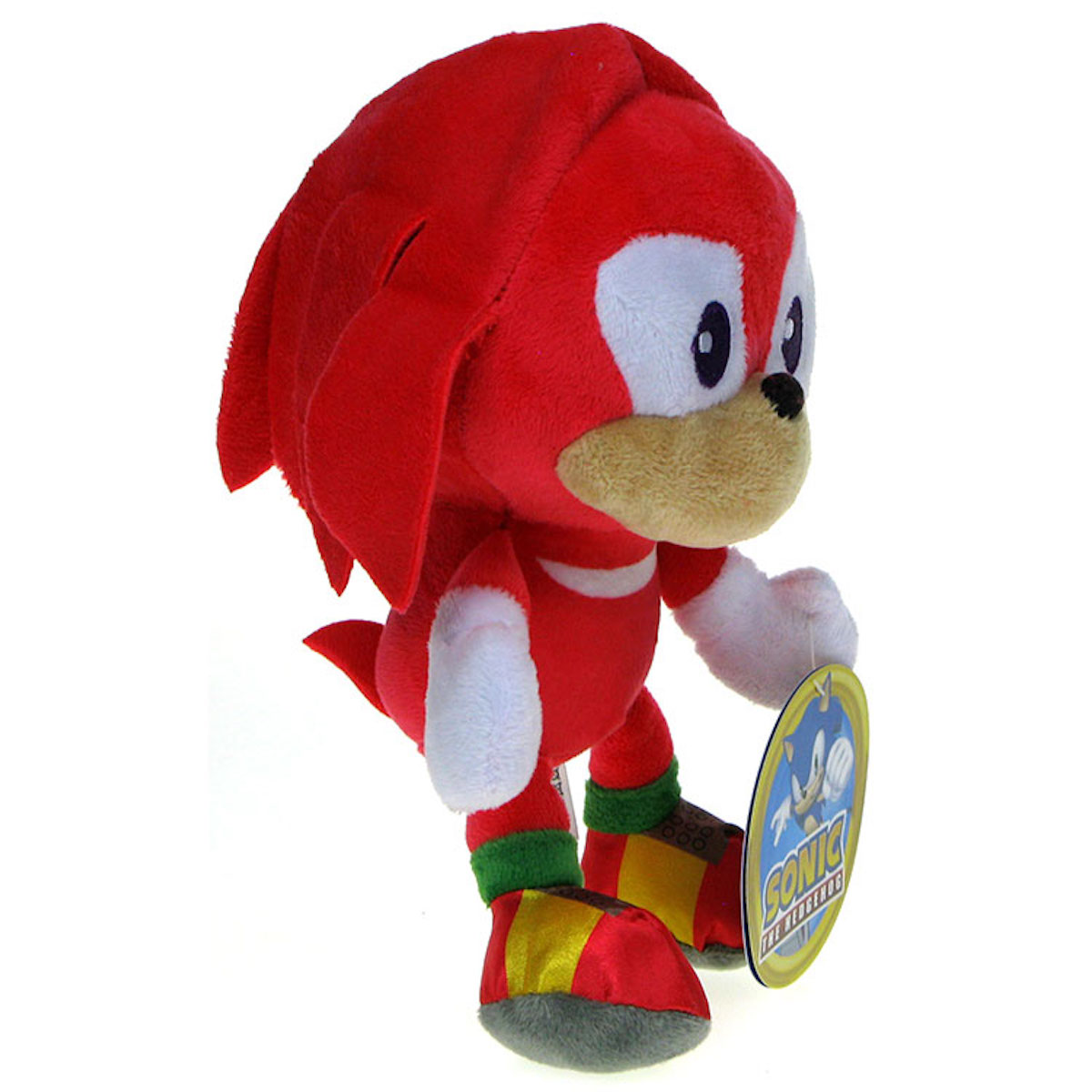 Ein rotes Knuckles-Plüschtier mit einem Etikett vor weißem Hintergrund.