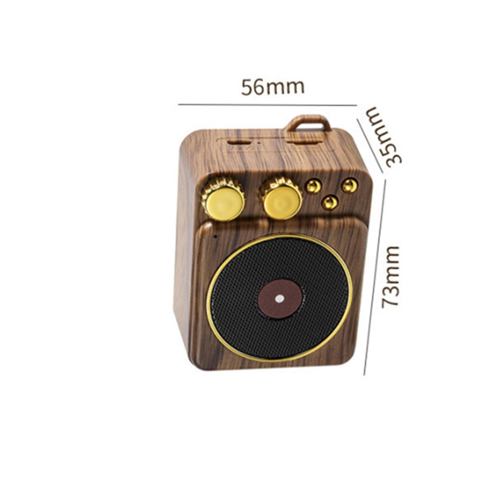 Retro-Lautsprecherabmessungen: 56 mm x 35 mm x 73 mm. Holzlautsprecher mit goldenen Akzenten und schwarzer Abdeckung.