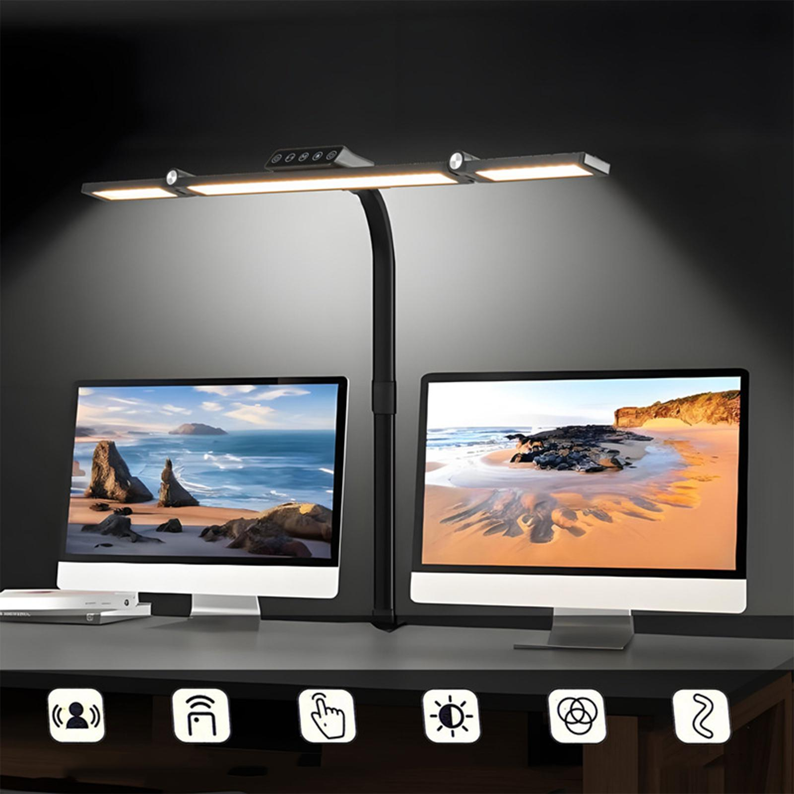 Schreibtisch-Setup mit einer schwarzen Lampe mit zwei LED-Leuchten, zwei Computermonitoren und Symbolen auf dem Schreibtisch.